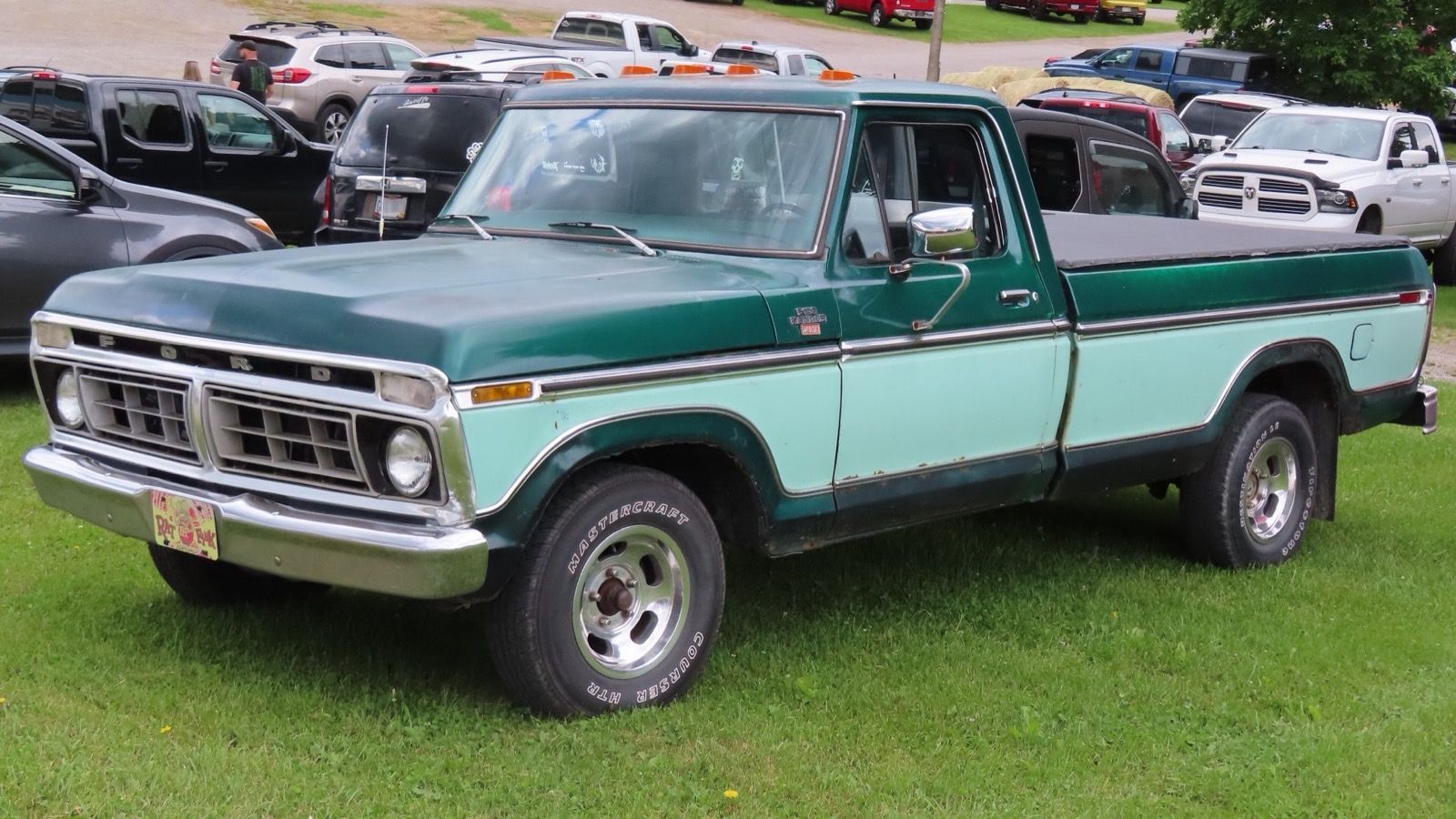 1977 Ford F-150 xlt pickup truck, front three-quarter left view