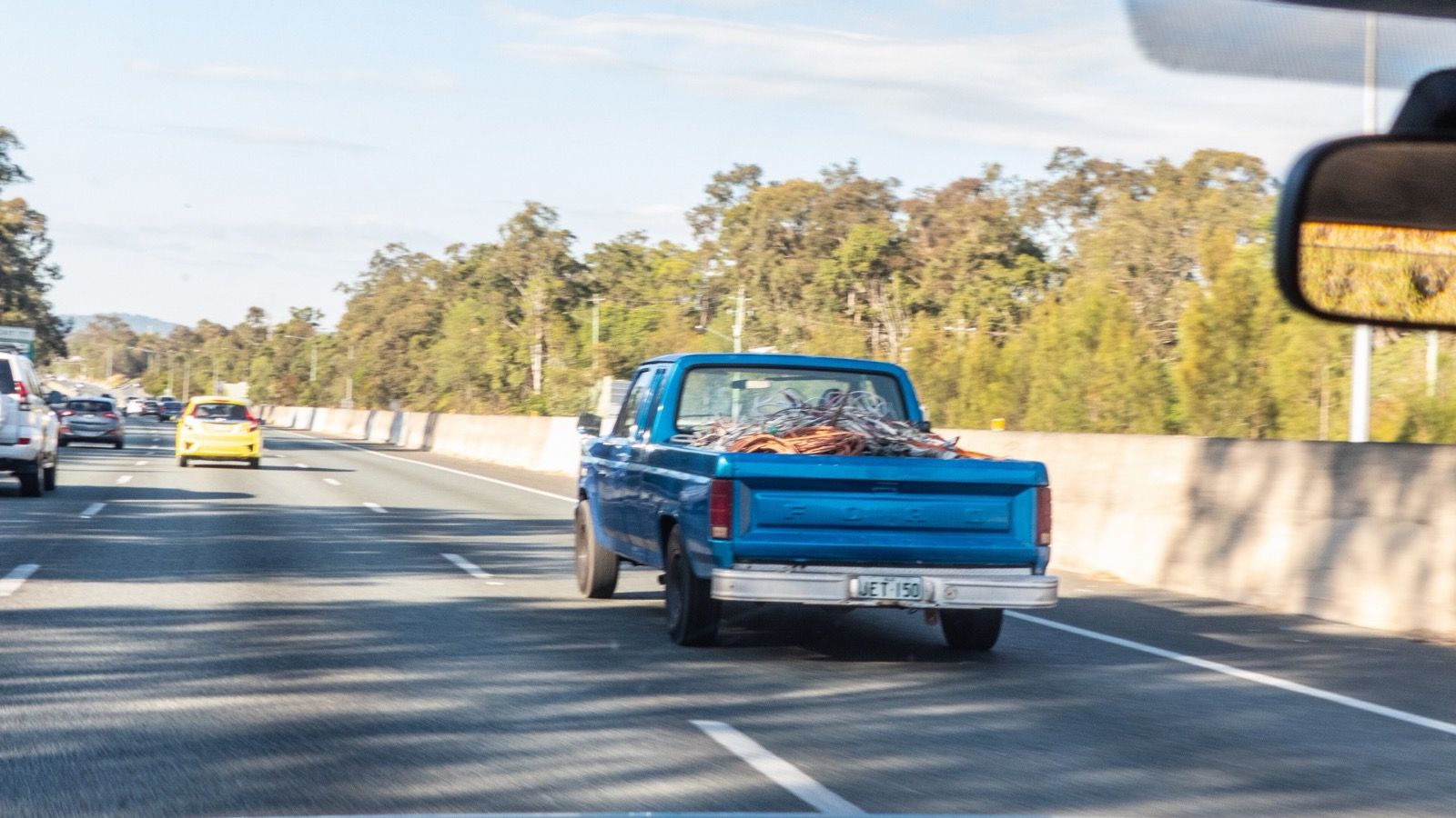 1985 Ford F-150 utility pickup truck, front three-quarter view