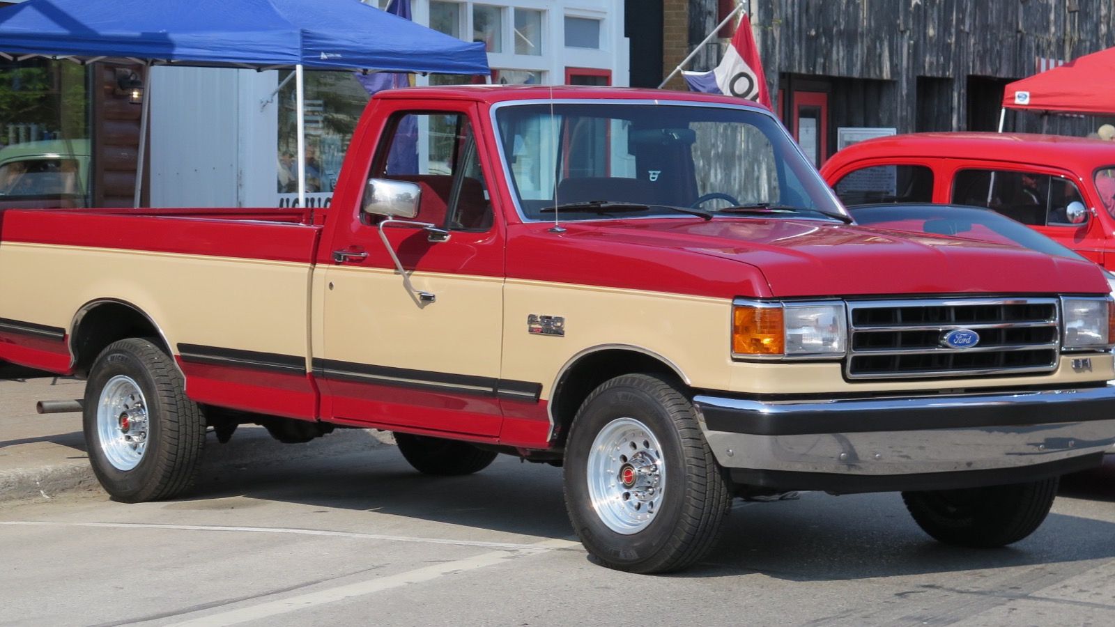 1991 Ford F-150 red lariat pickup truck, front three-quarter right view