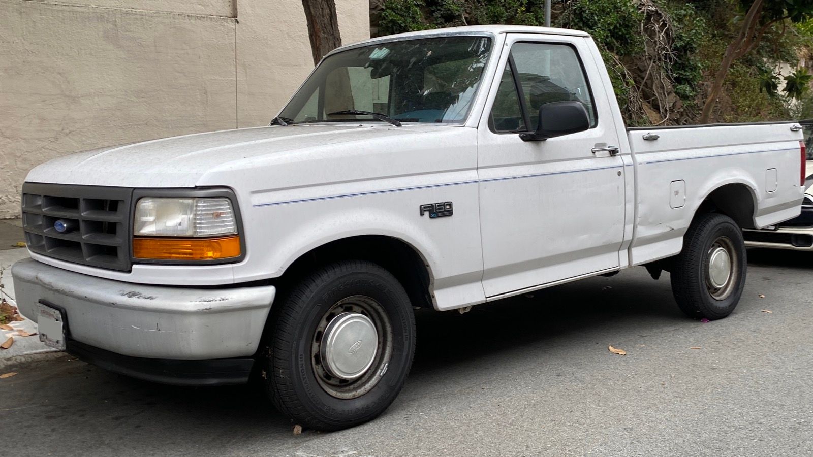 Ninth-generation Ford F-150 — 1994 white, front three-quarter left view