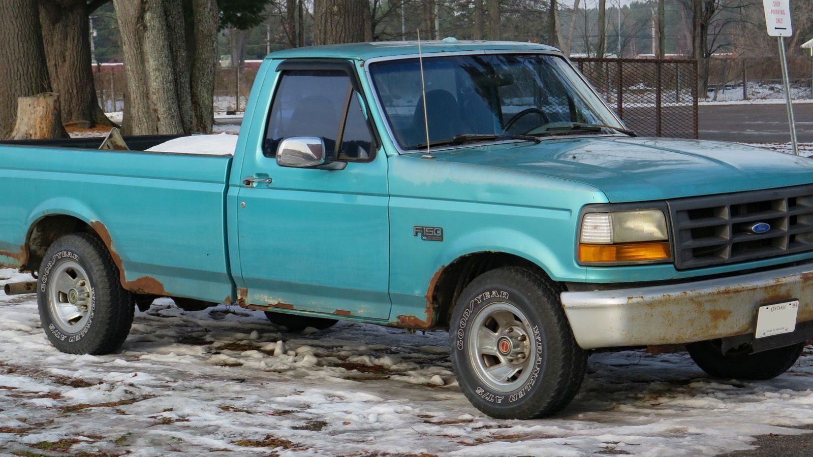 1995 Ford F-150 calypso styleside pickup truck, front three-quarter right view