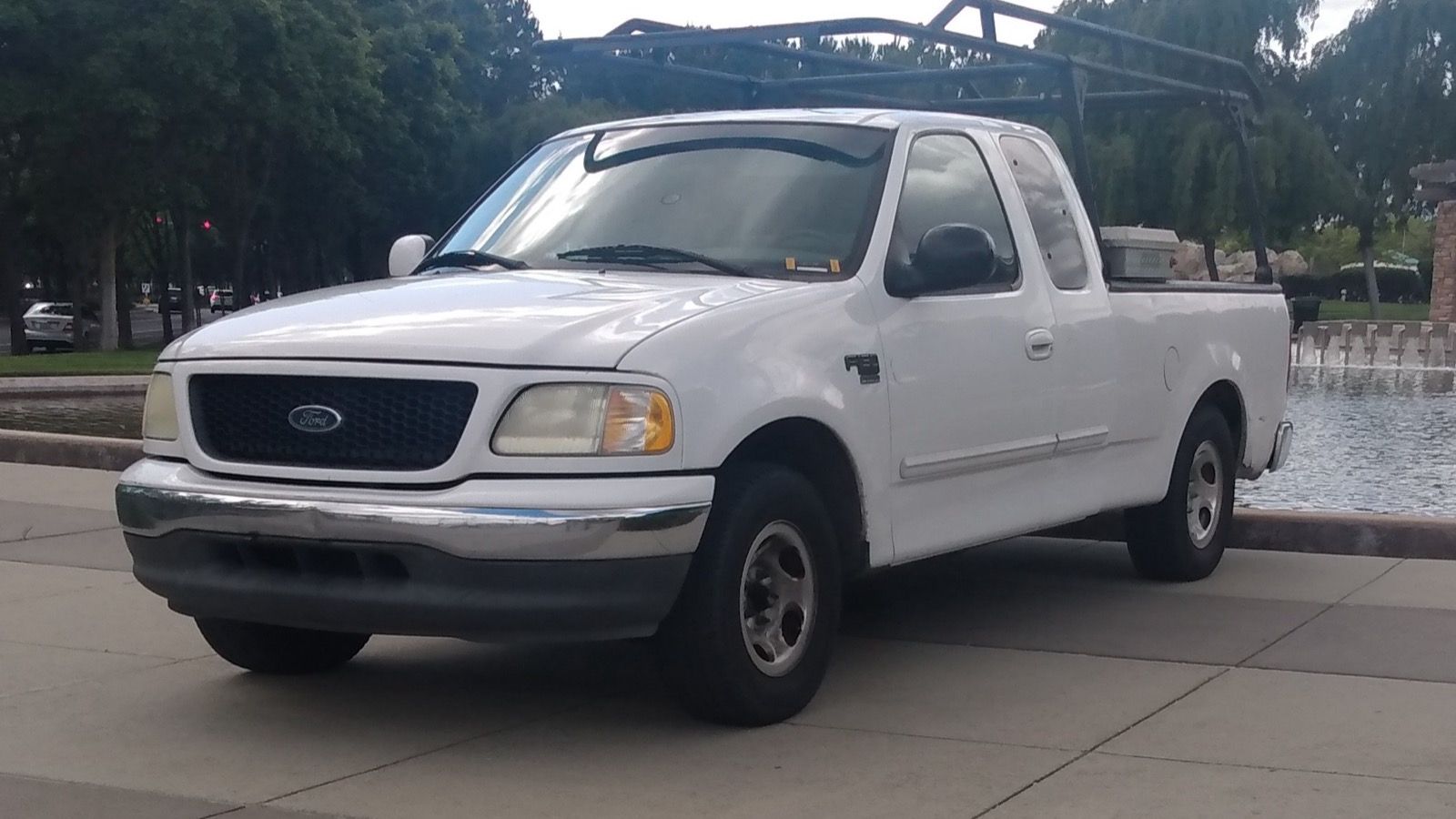 2002 Ford F-150 pickup truck, front three-quarter view