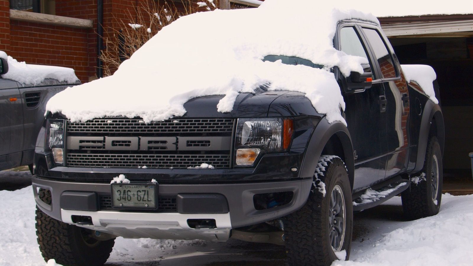 2011 Ford F-150 raptor pickup truck, front three-quarter view