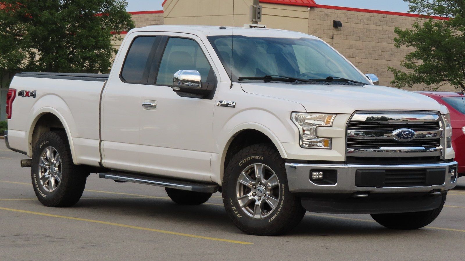 2015 Ford F-150 lariat pickup truck, front three-quarter right view
