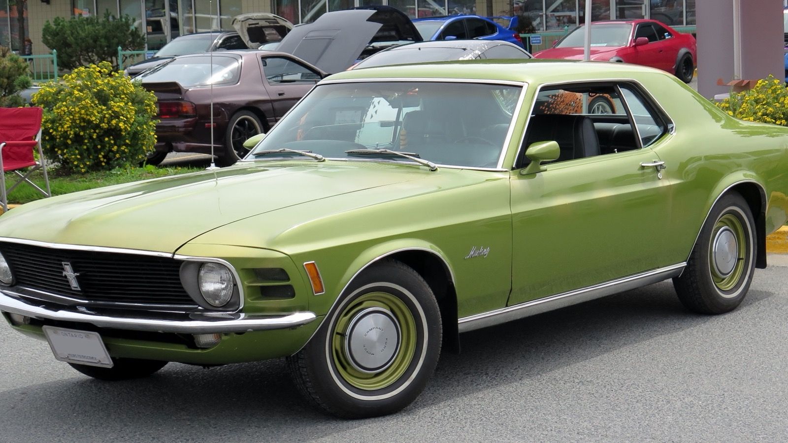 1970 Ford Mustang — base coupe in medium lime, front three-quarter view