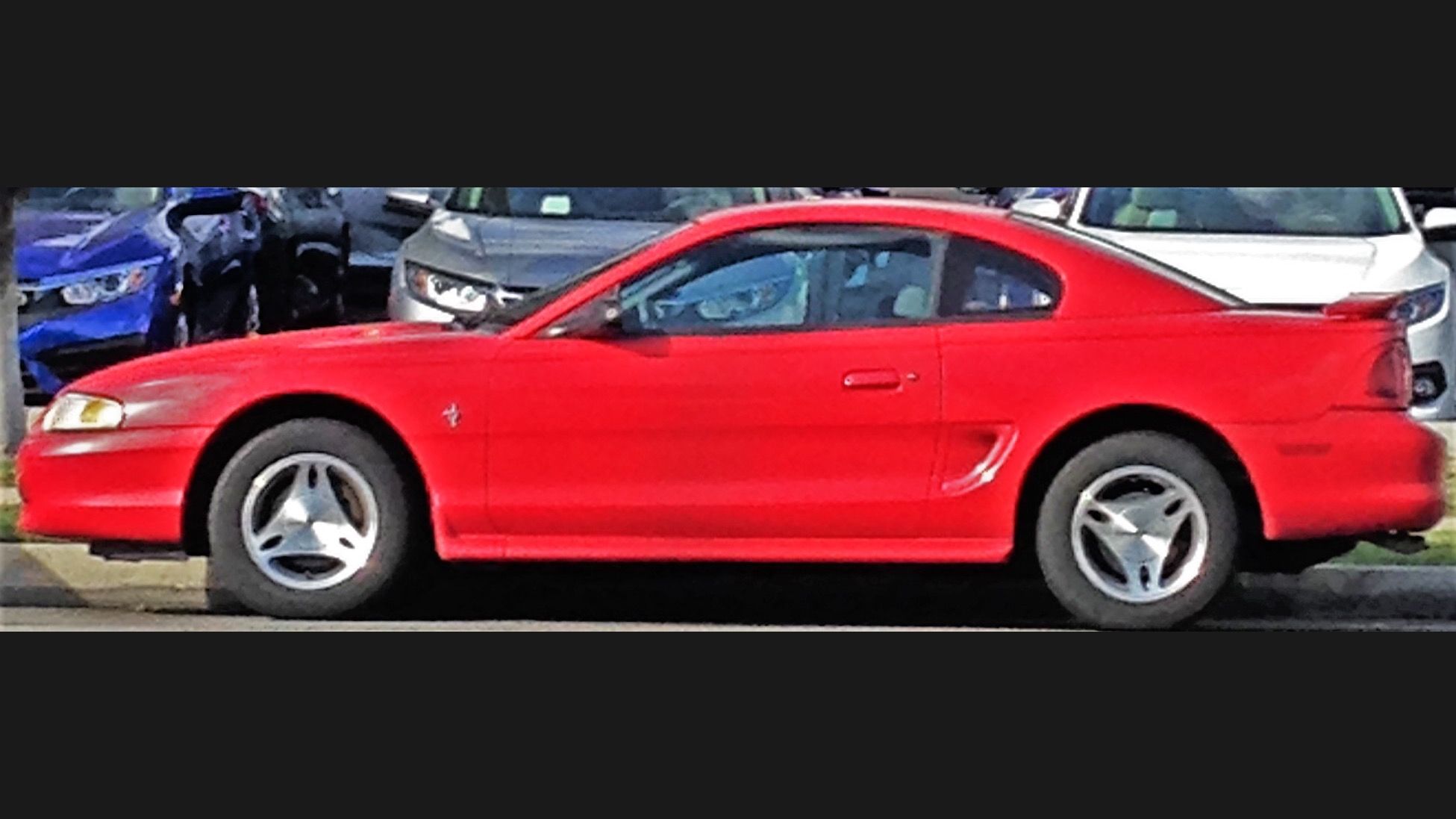 1994–1998 Ford Mustang, fourth generation SN95 — red coupe, side profile