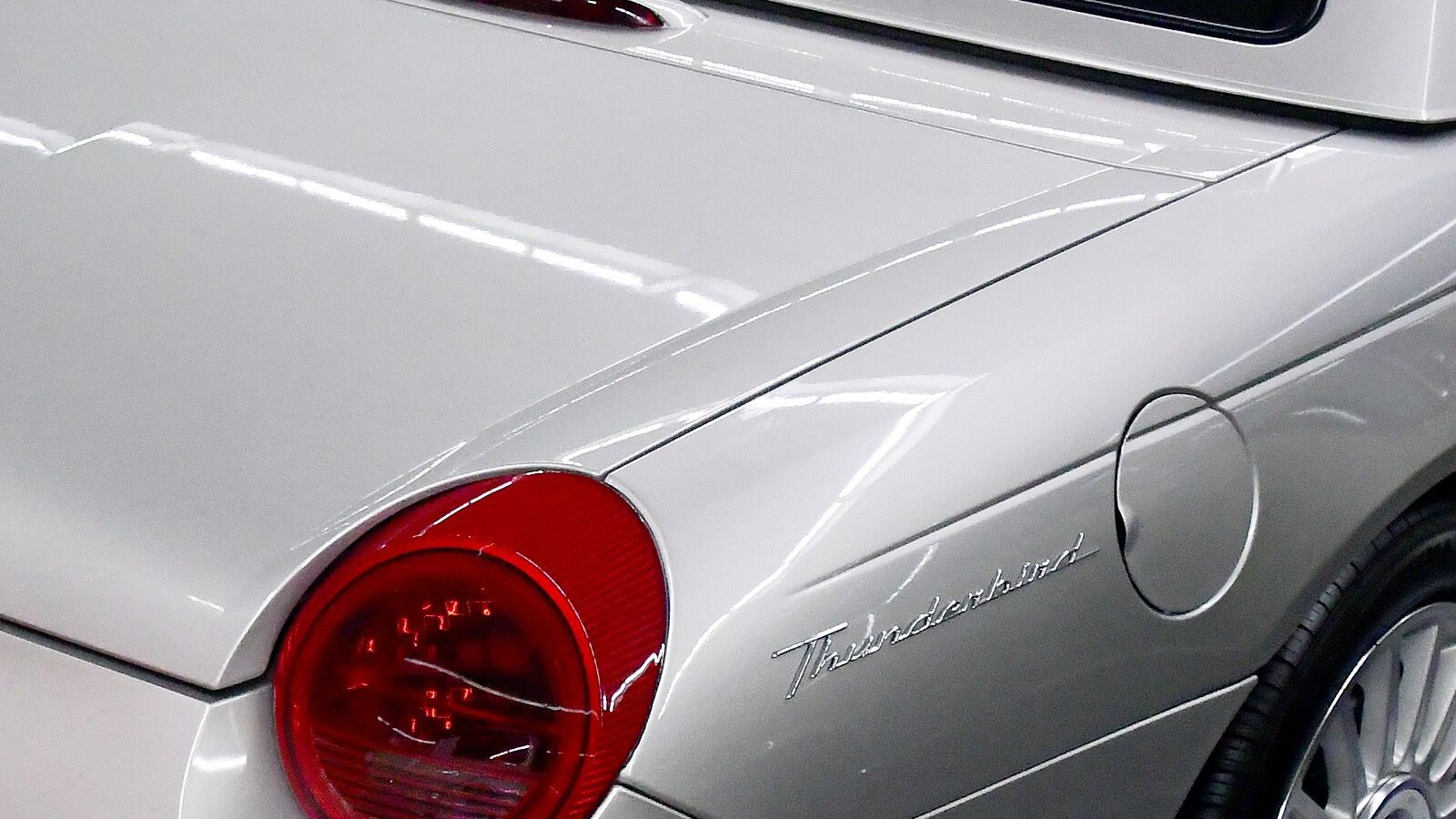 2004 Ford Thunderbird, eleventh-generation retro roadster — convertible, front three-quarter view