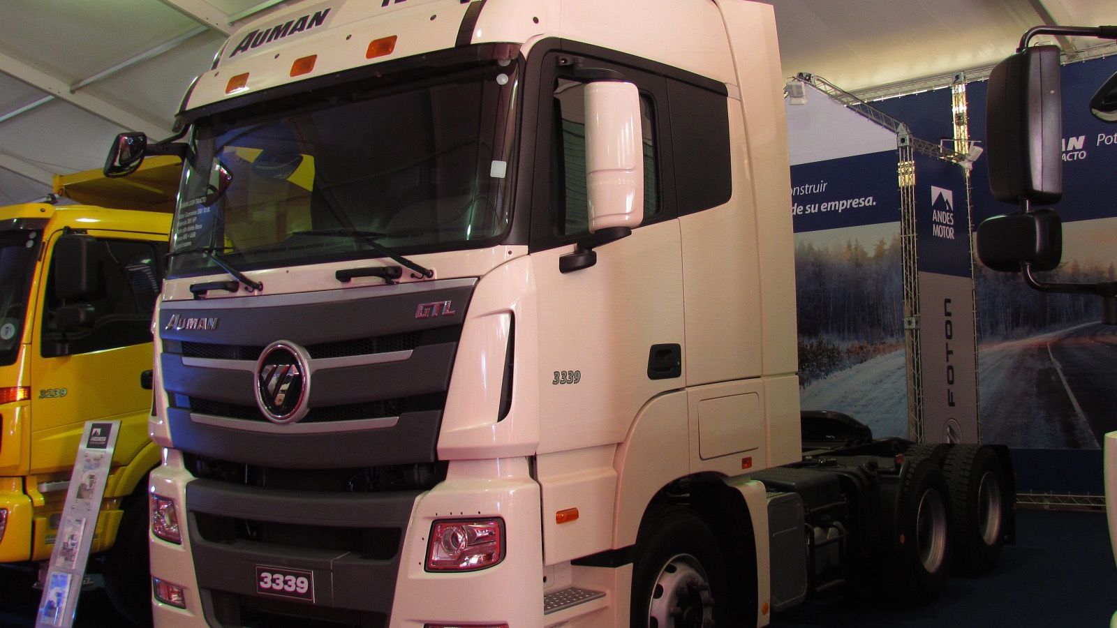 White 2014 Foton Auman 3339 GTL tractor unit on display, front three-quarter view