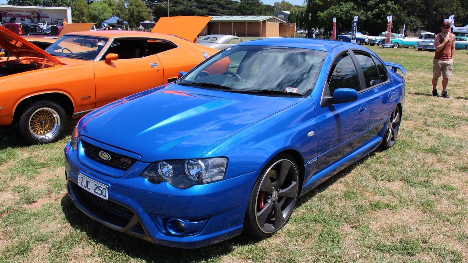 Blue 2006 FPV F6 Typhoon (BF Falcon) sedan at a car show, front three-quarter view
