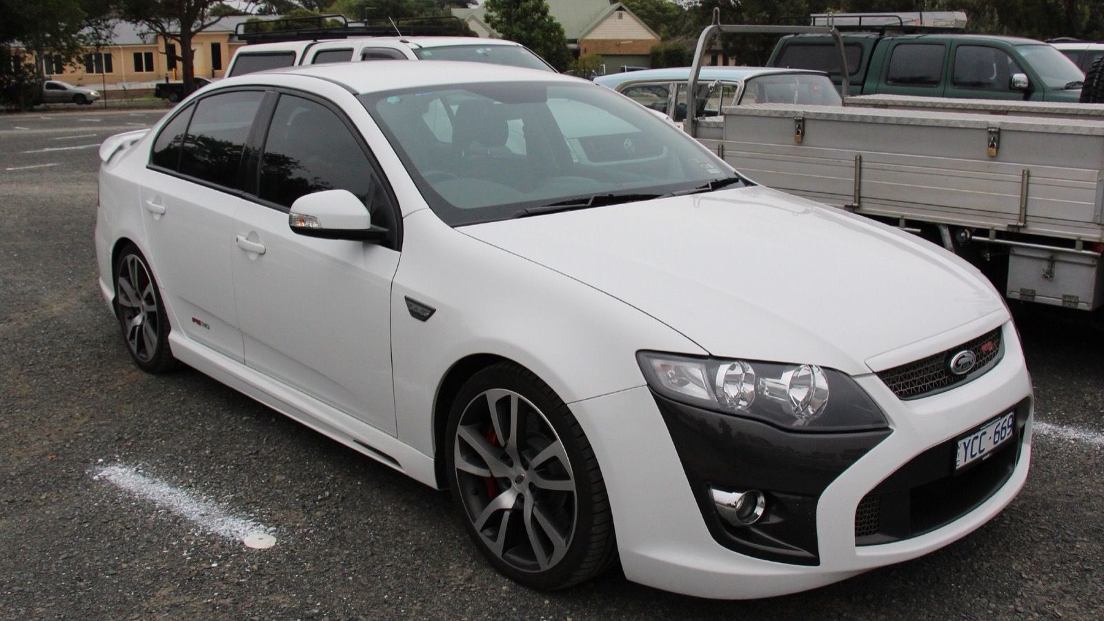 White 2011 FPV F6 (FG Falcon) sedan, front three-quarter view