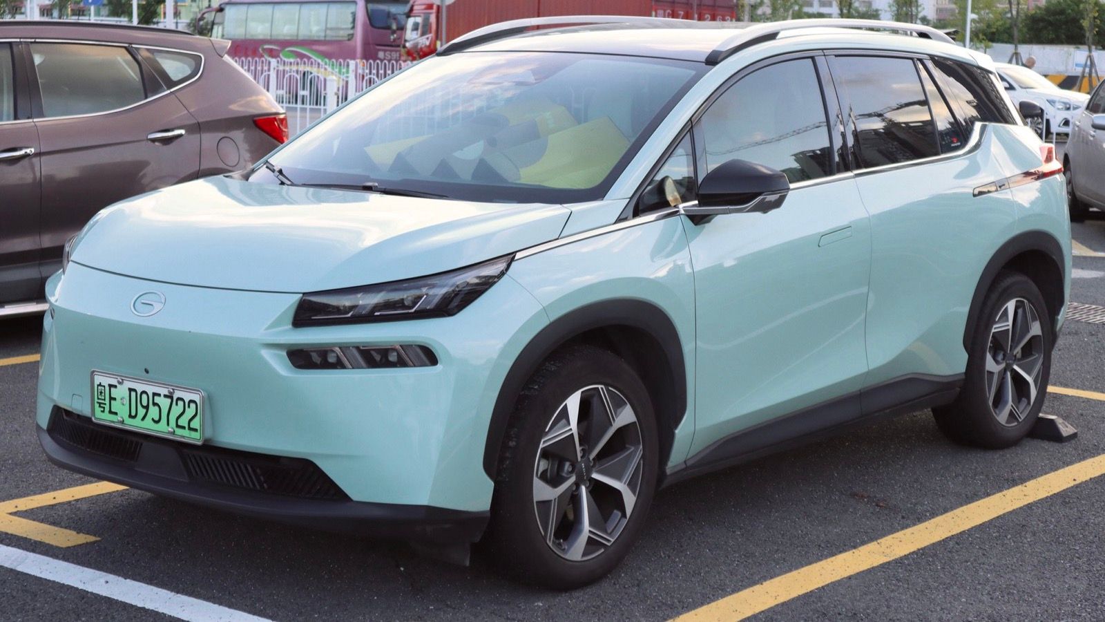 Mint green GAC Aion V Plus electric SUV, front three-quarter view