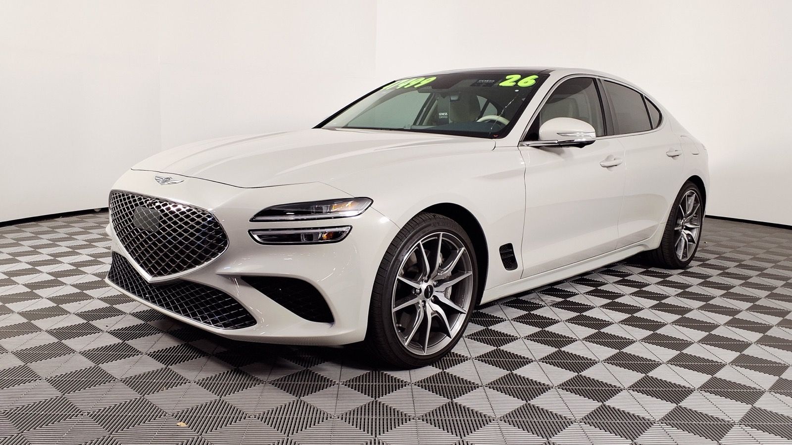 White 2026 Genesis G70 2.5T Prestige, front three-quarter view