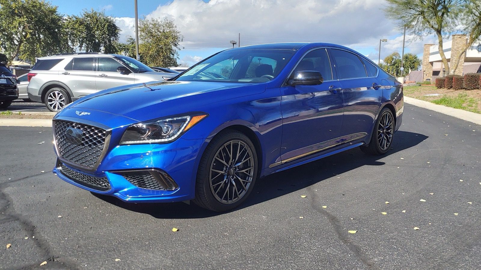 Blue 2020 Genesis G80 3.3T Sport, front three-quarter view