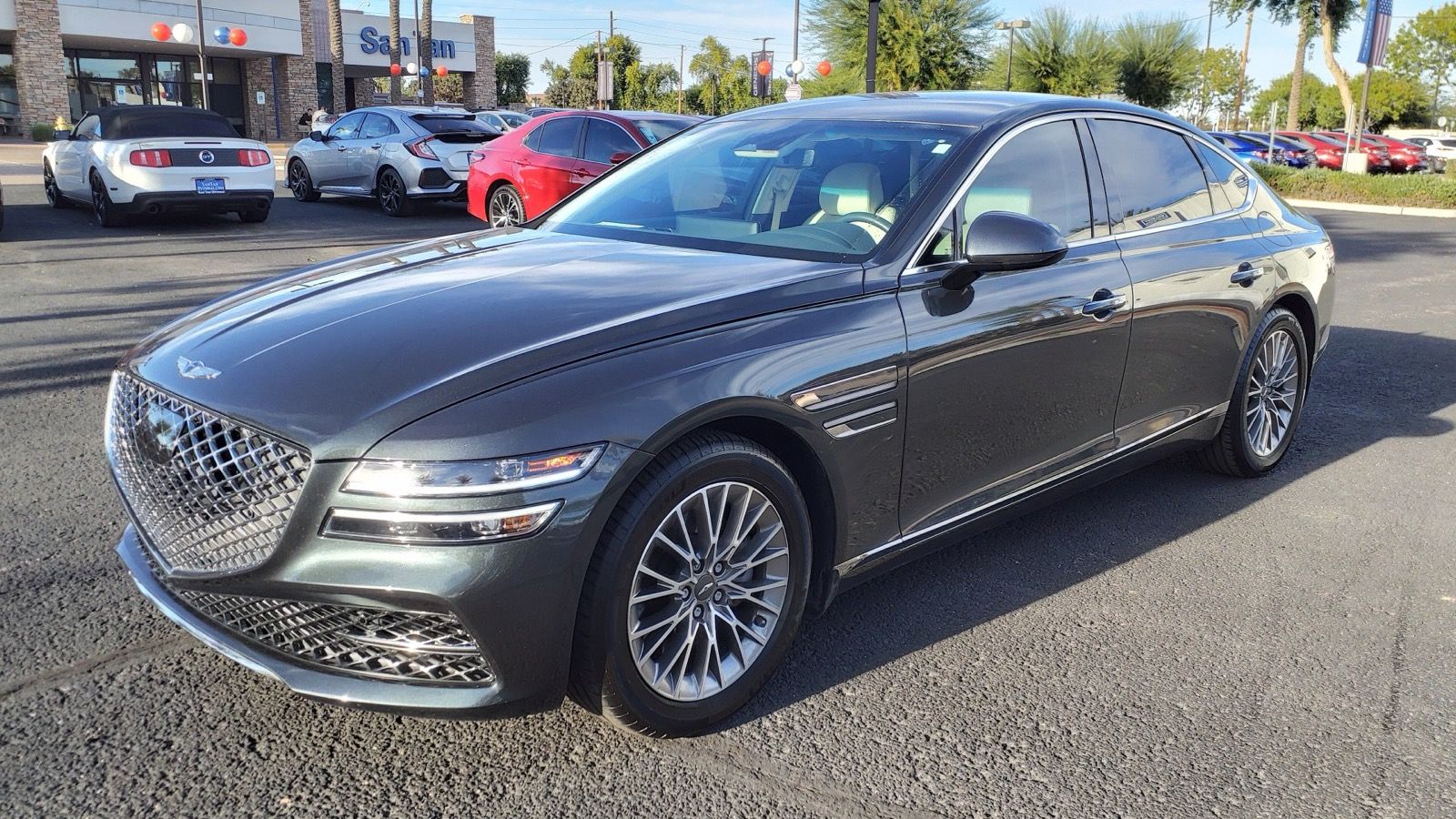 Dark green 2022 Genesis G80 2.5T, front three-quarter view