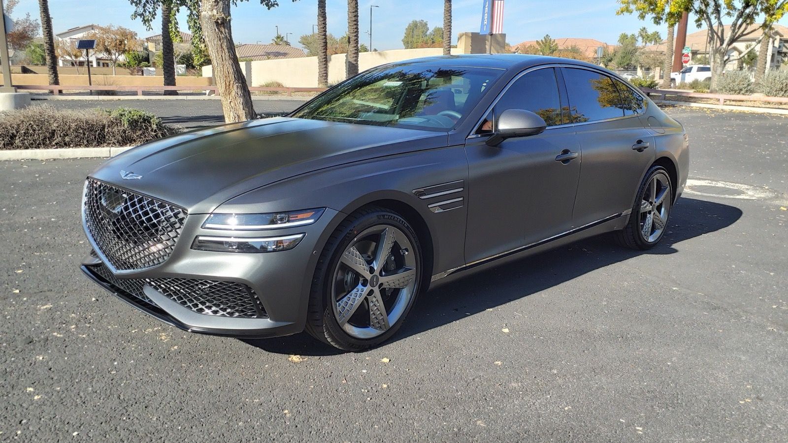 Grey second-generation Genesis G80 3.5T Sport, front three-quarter view