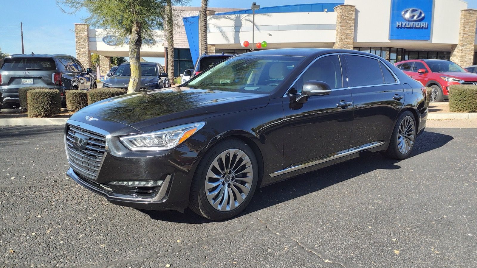 Black 2019 Genesis G90 3.3T Premium, front three-quarter view