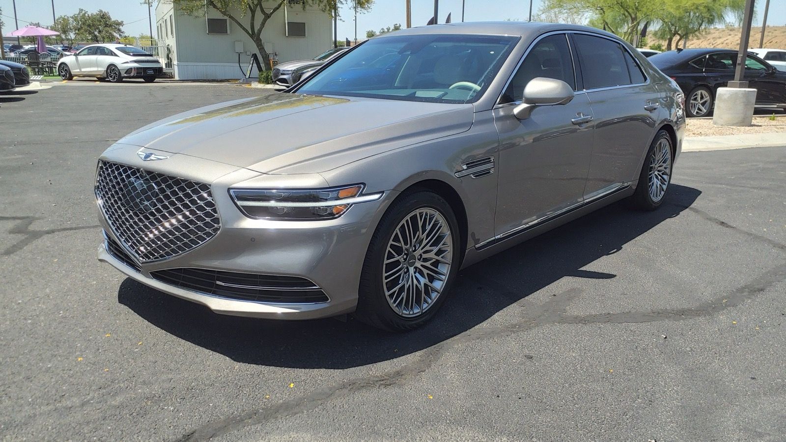 Silver 2021 Genesis G90 5.0 Ultimate, front three-quarter view