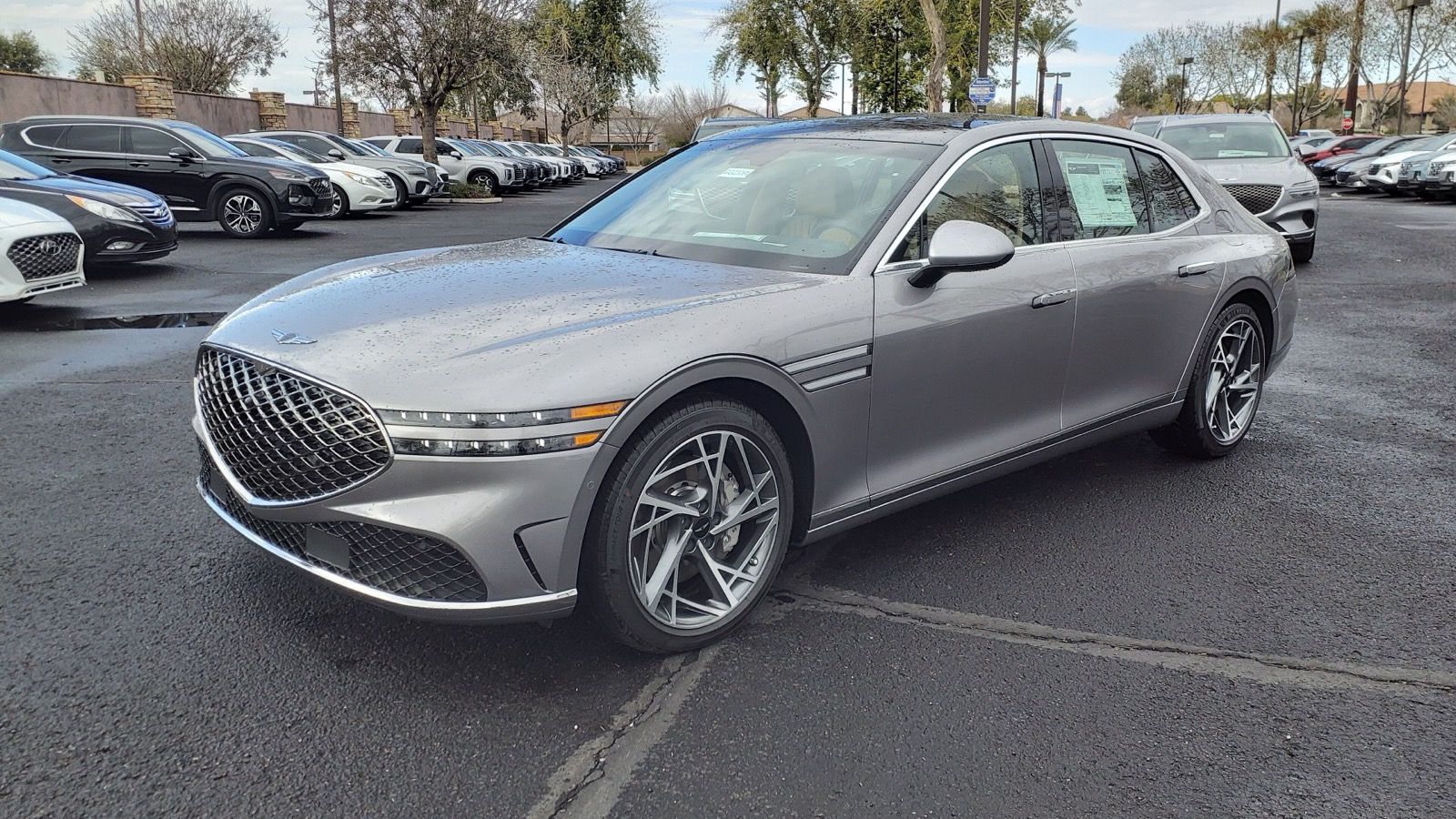 Silver 2023 Genesis G90 3.5T, front three-quarter view