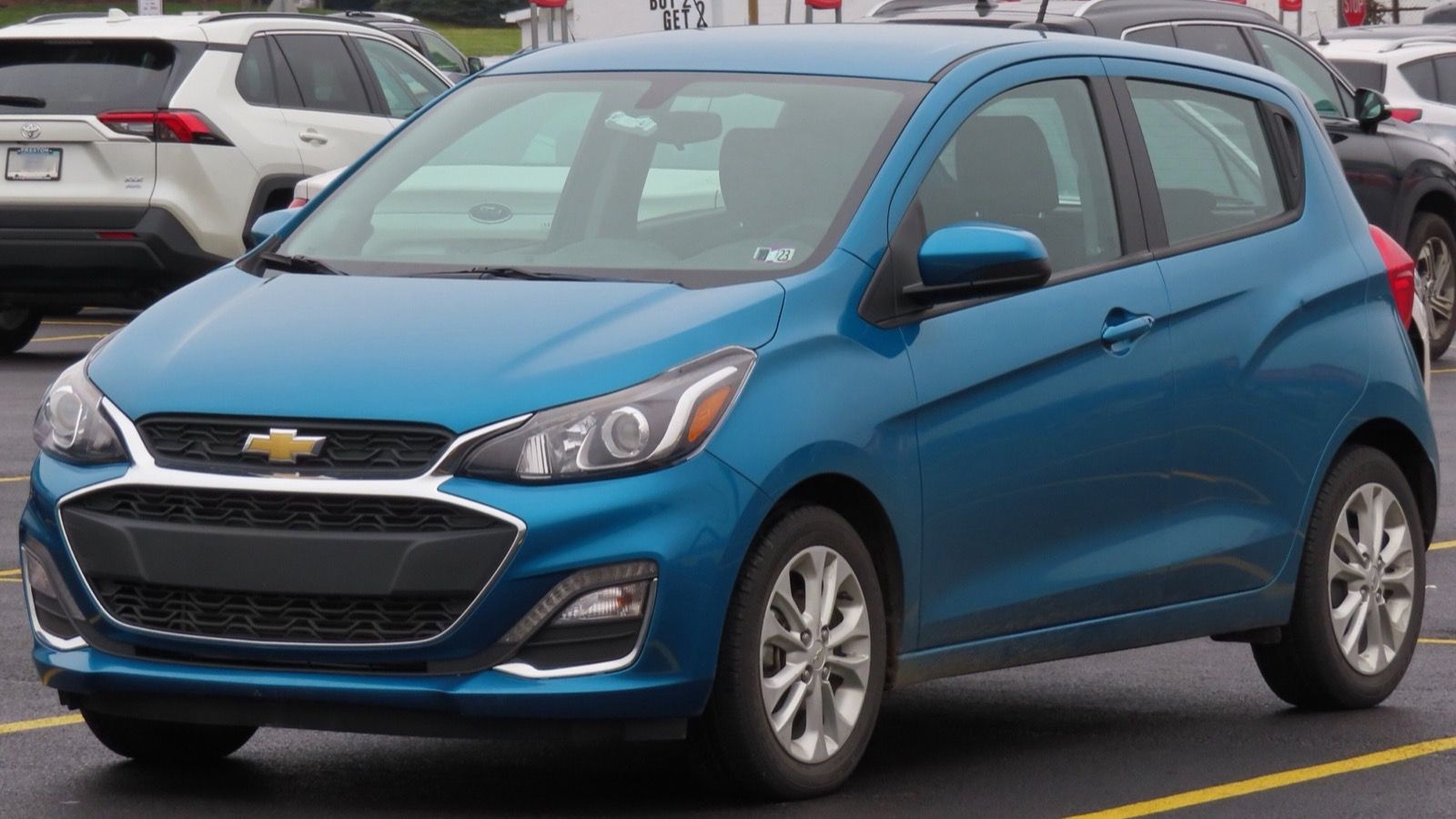 2019 Chevrolet Spark 1LT hatchback, front three-quarter view from the left