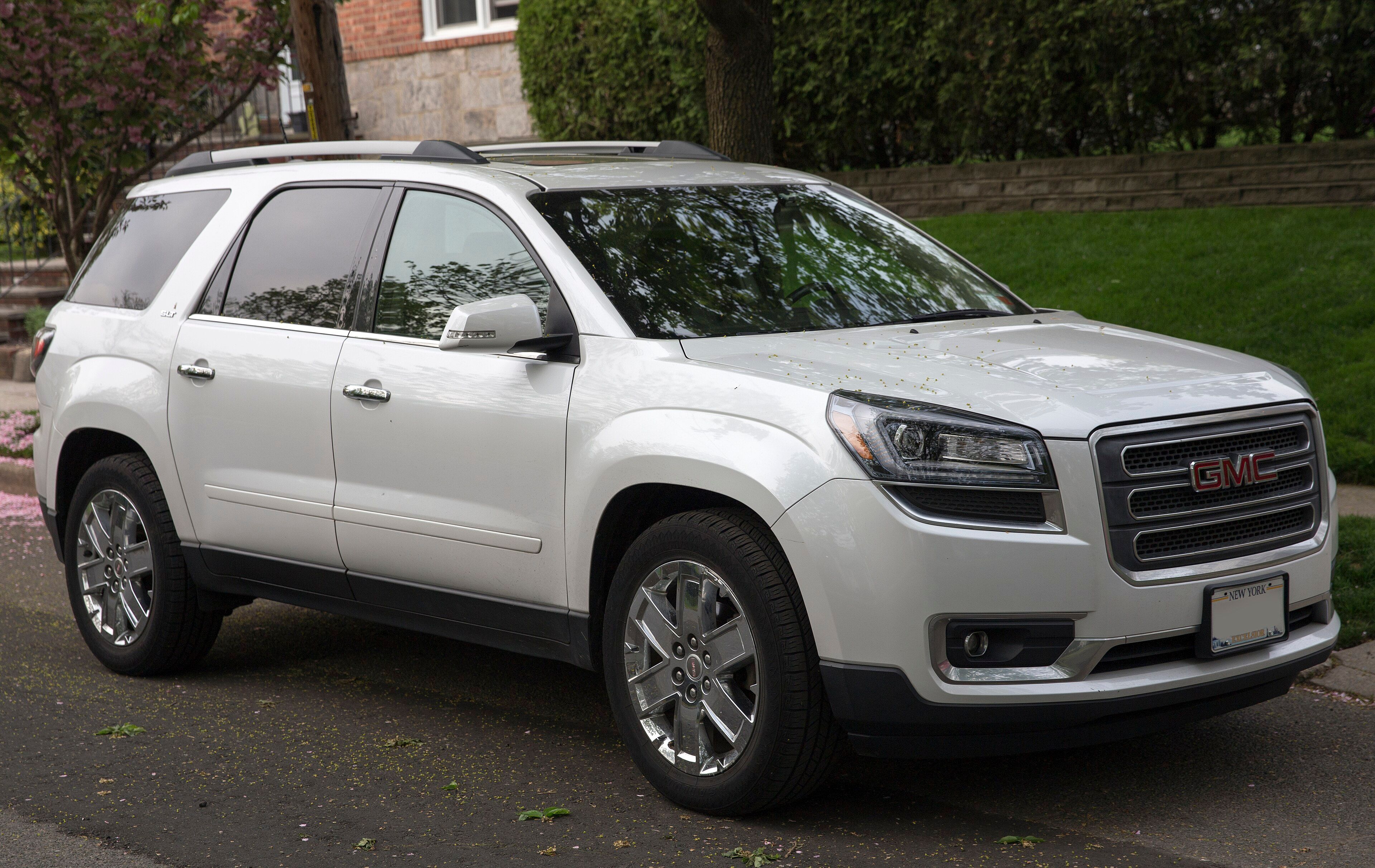 2017 GMC Acadia Limited SLT crossover in Summit White, front right view