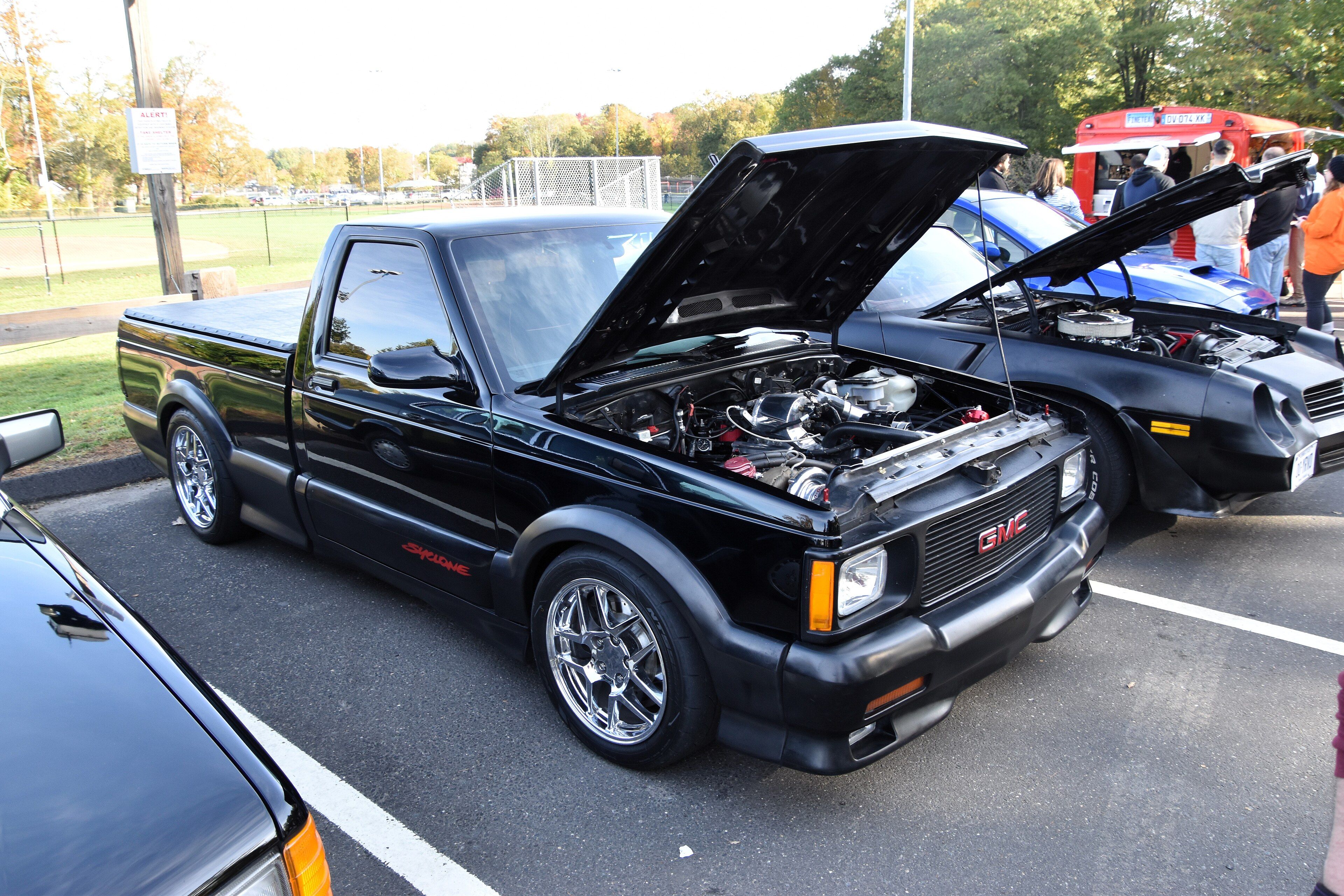 Black 1991 GMC Syclone performance pickup, front three-quarter view
