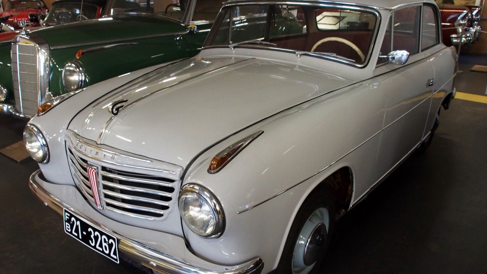 Grey Goliath GP700 two-door saloon on museum display, front three-quarter view