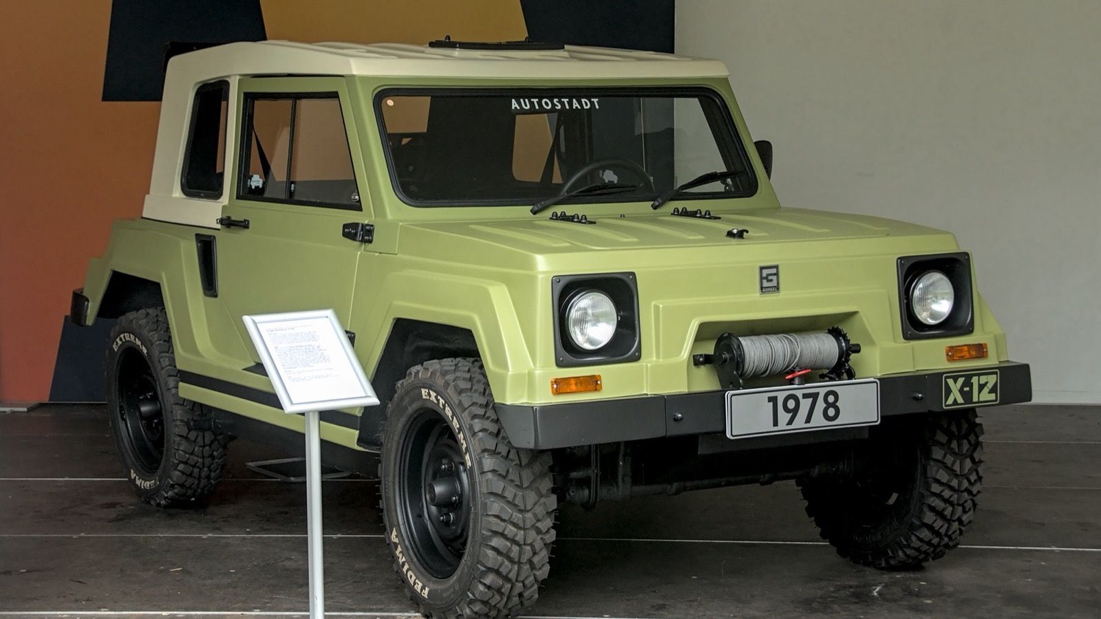 1978 Gurgel Xavante X-12 TR in light green, front three-quarter view on museum display.