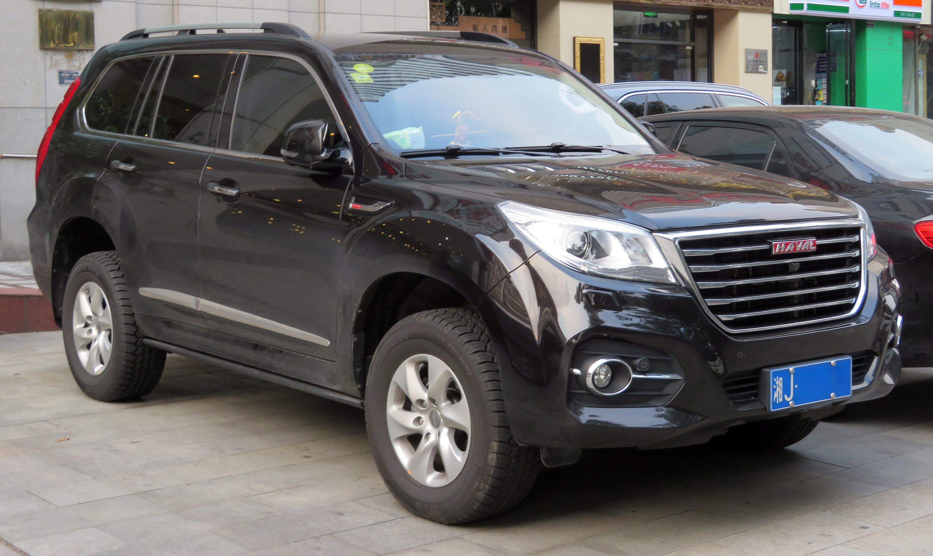 Black 2016 Haval H9 full-size body-on-frame SUV, front three-quarter view