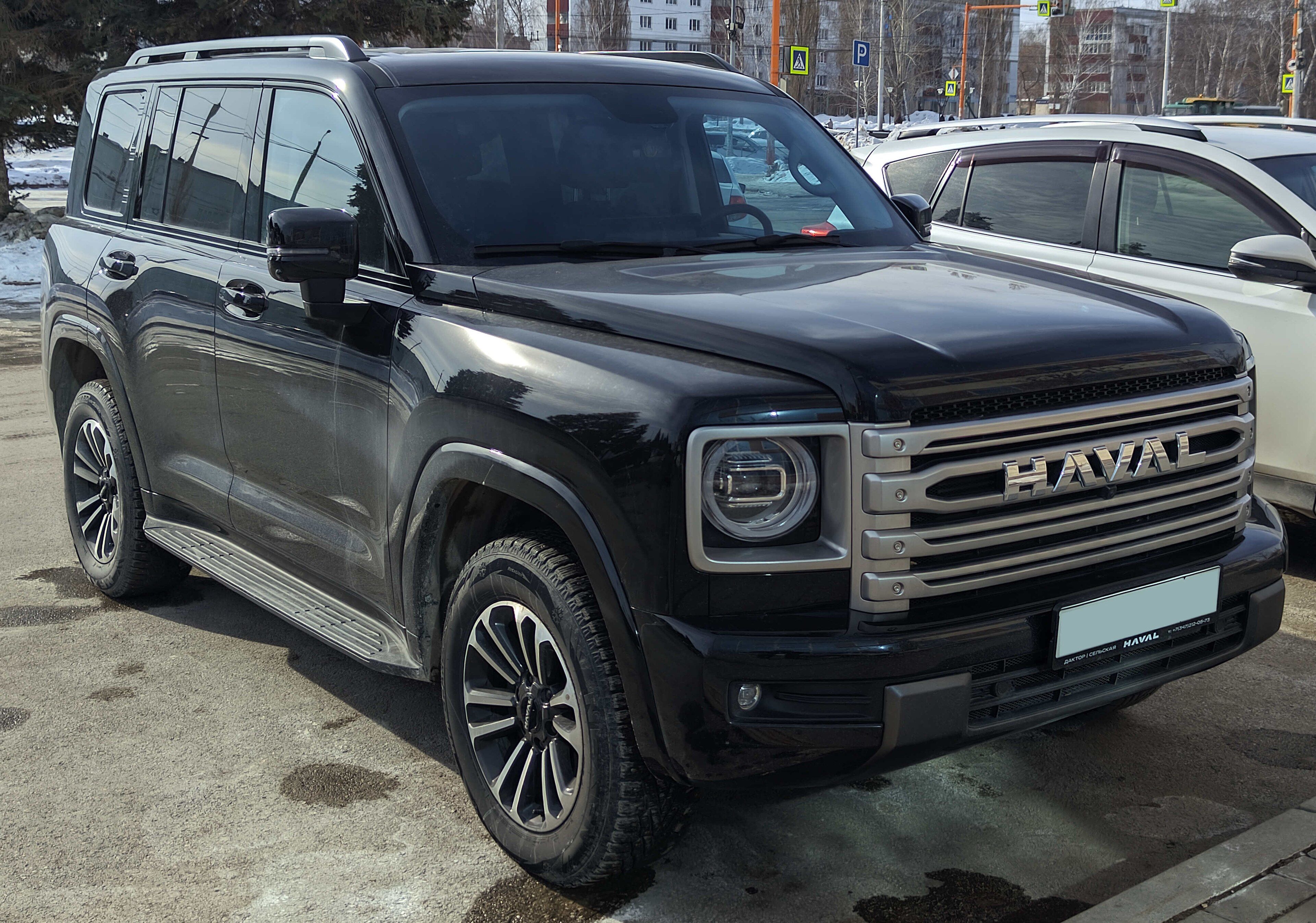 Black 2024 second-generation Haval H9 full-size SUV, front three-quarter view