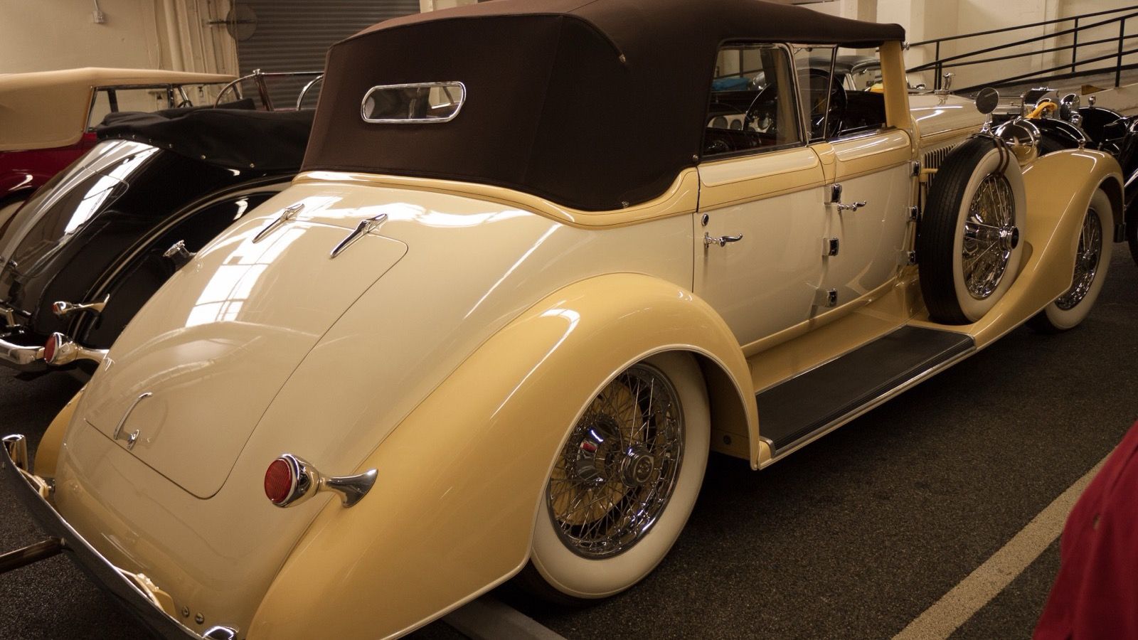 Cream 1928 Hispano-Suiza H6C transformable berline by Hibbard & Darrin, rear three-quarter view