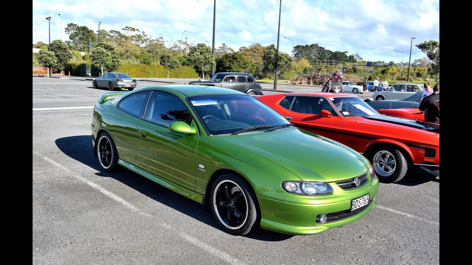 Green 2003 Holden Monaro CV8 coupe at a car meet, front three-quarter view