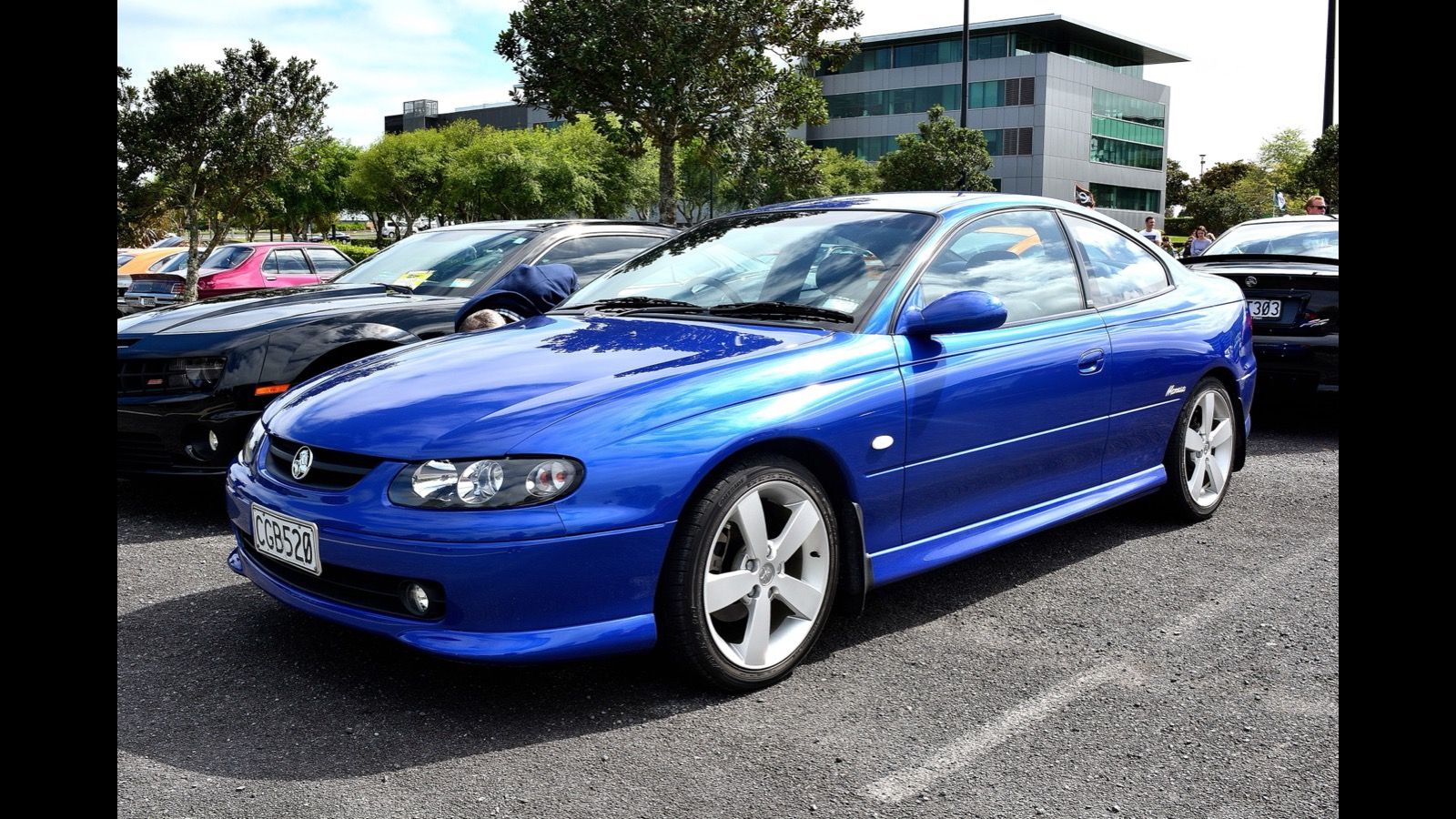 Blue 2004 Holden V2 Monaro CV8 coupe, front three-quarter view