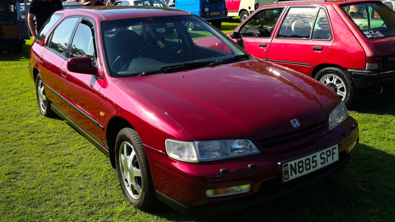 Red 1995 Honda Accord Aerodeck wagon, front three-quarter view