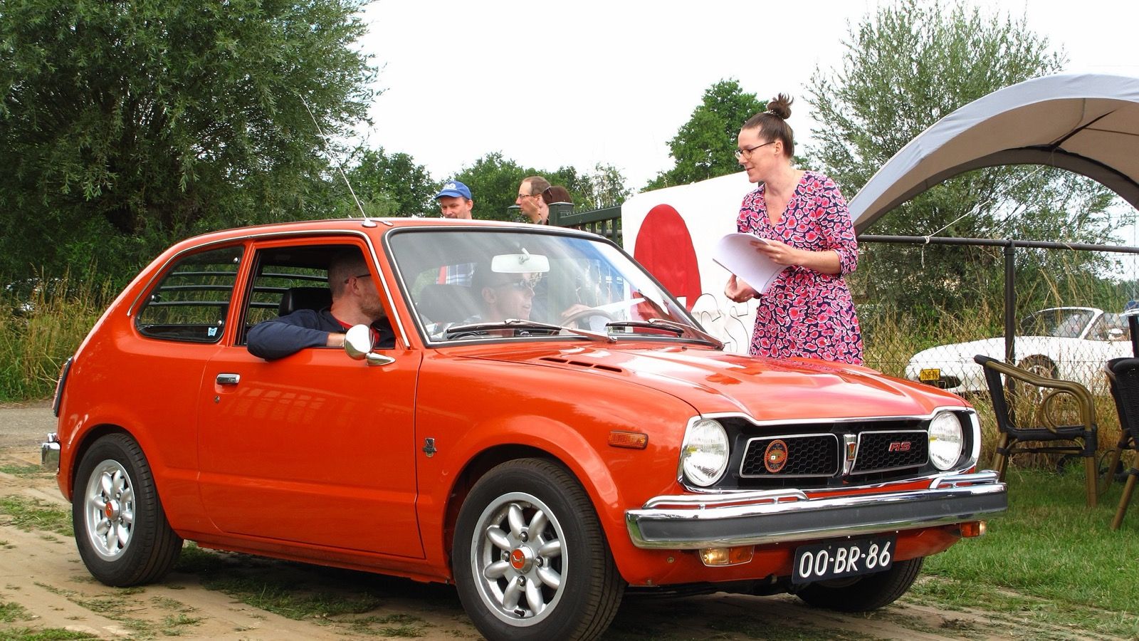 1974 Honda Civic — orange 1200 hatchback, front three-quarter view
