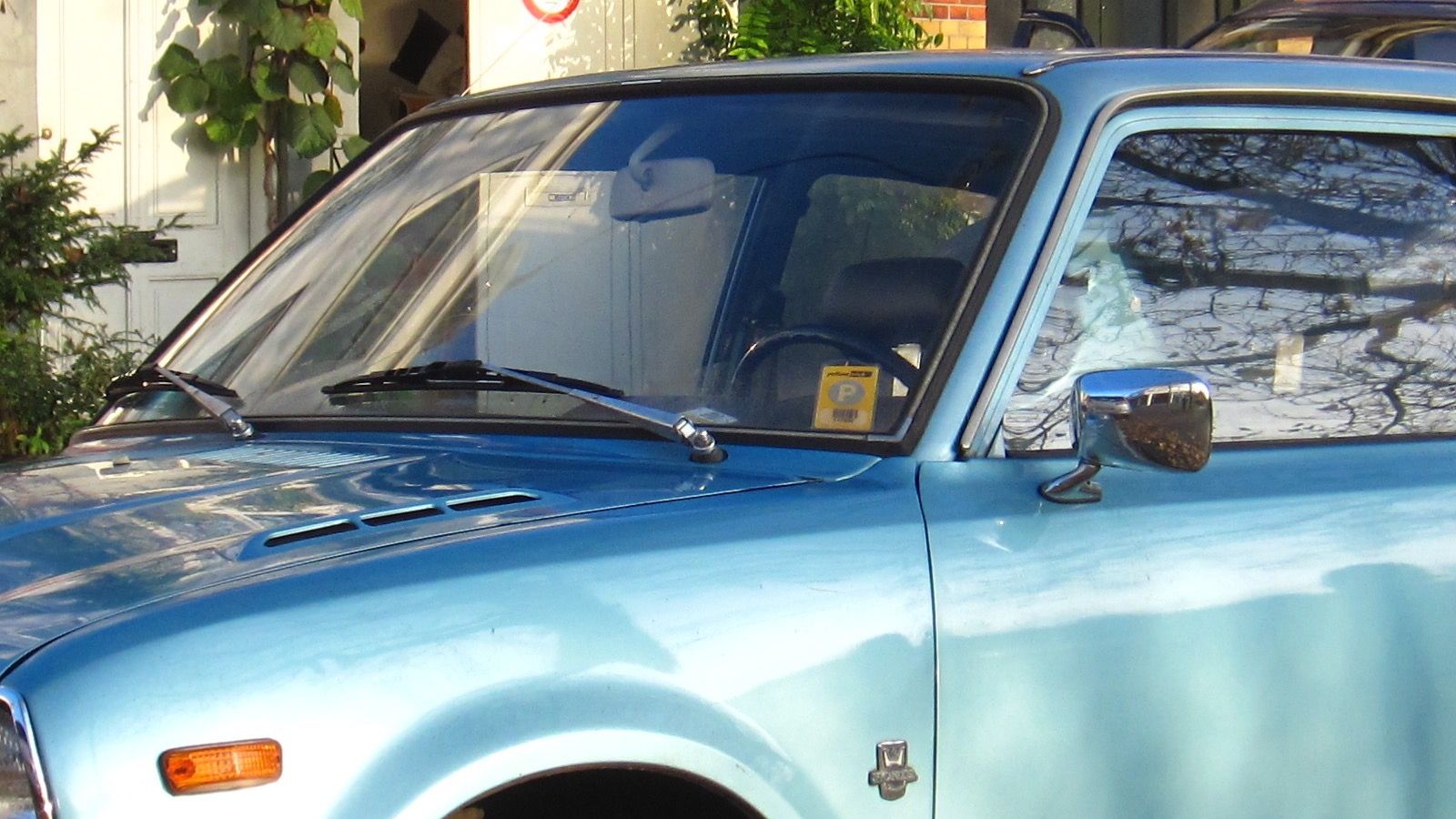 1977 Honda Civic — blue hatchback, front three-quarter view