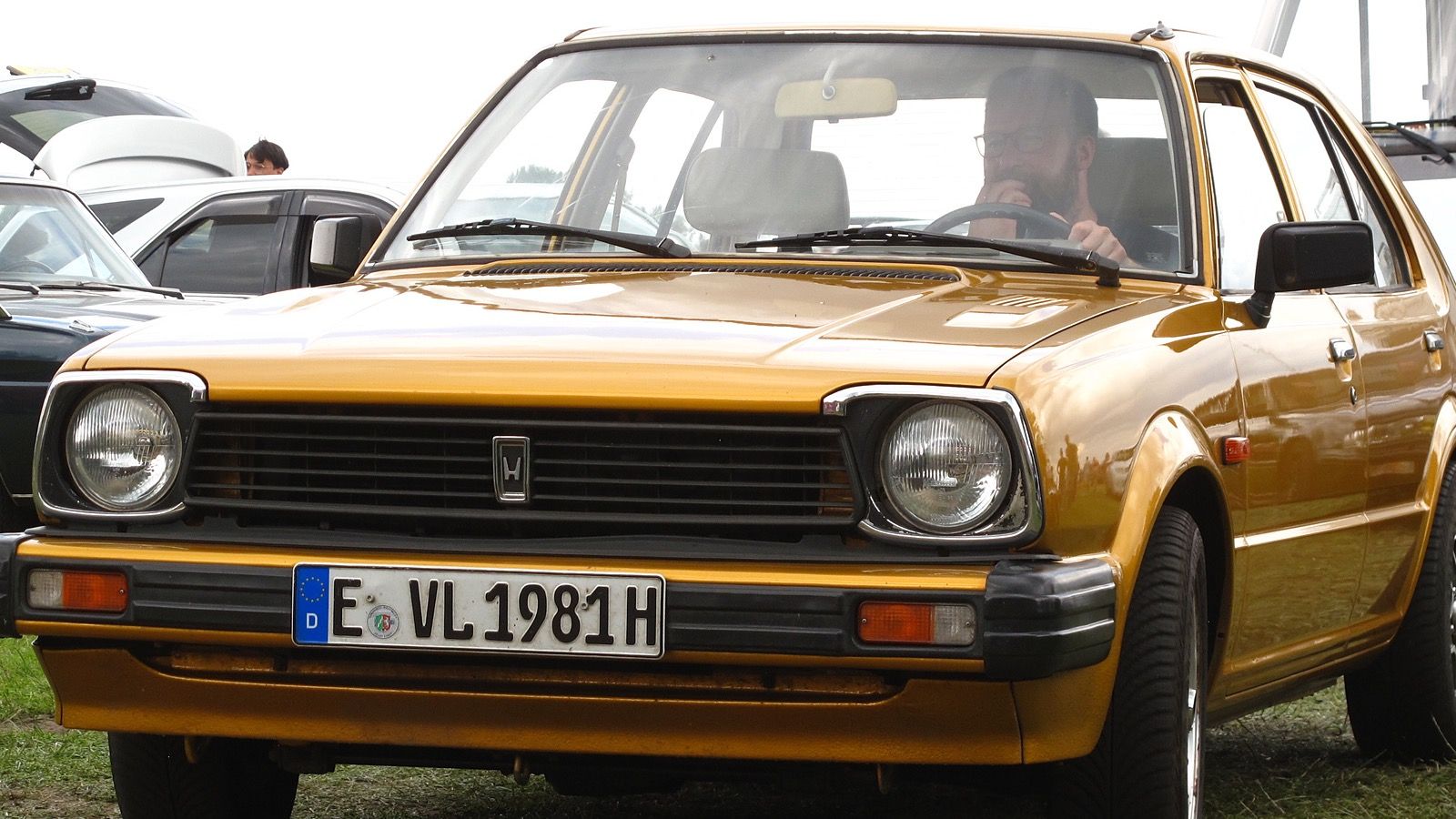 1981 Honda Civic — red hatchback, front three-quarter view