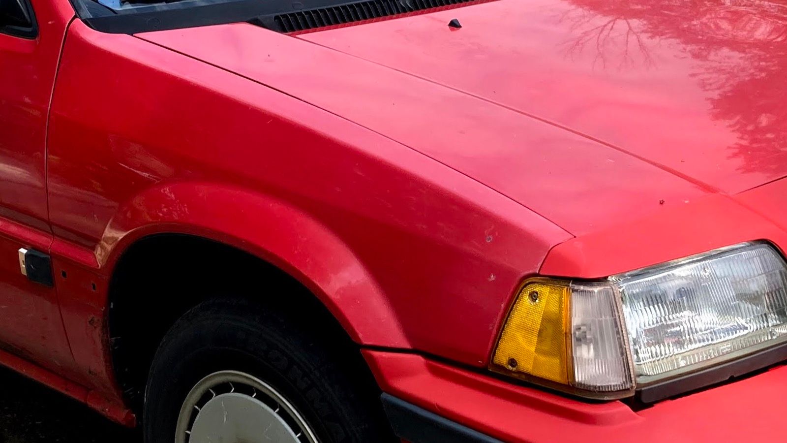 1986 Honda Civic, AH/AT third generation — red Si hatchback, front three-quarter view