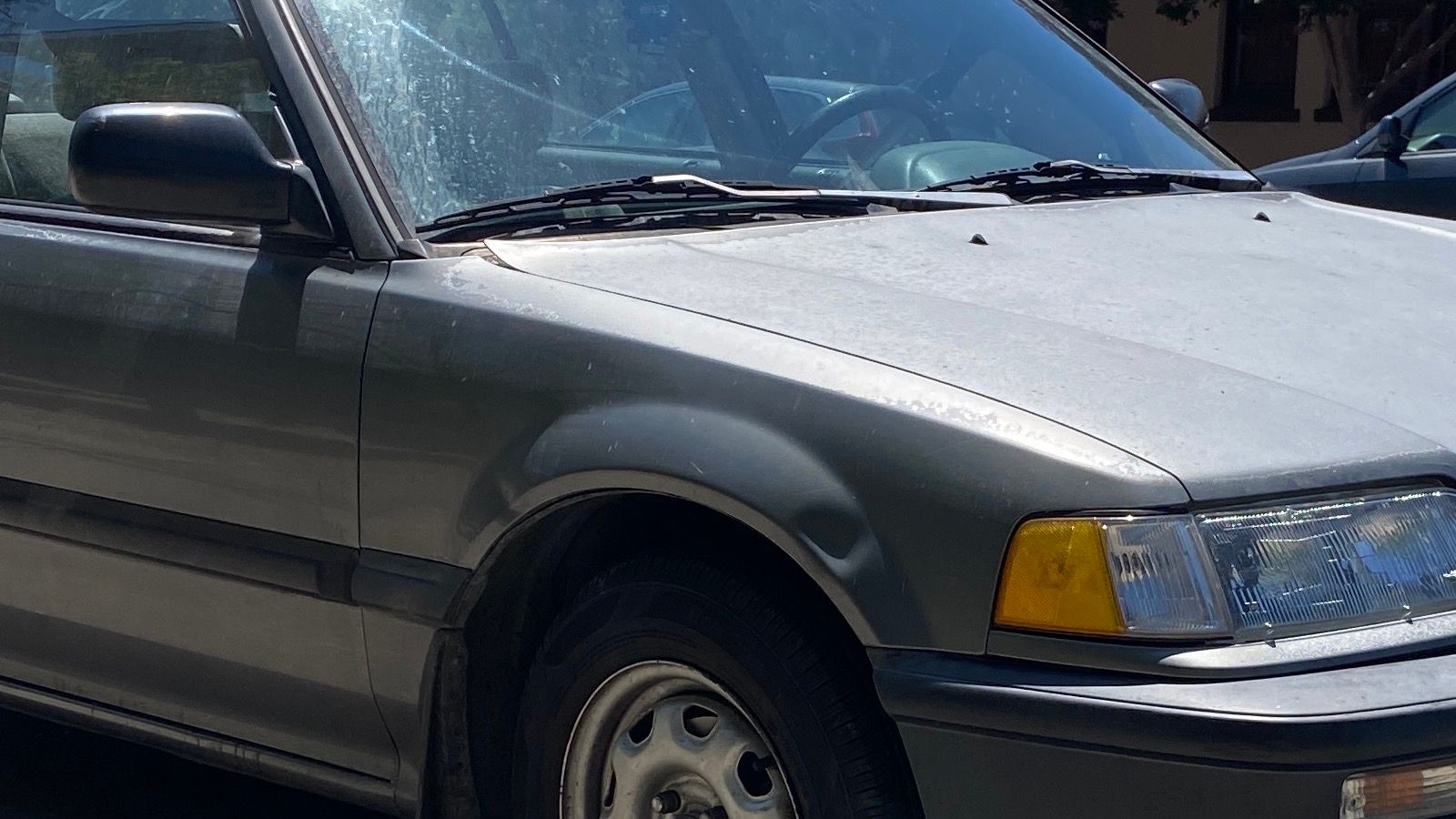 1990 Honda Civic — gray sedan, front three-quarter view