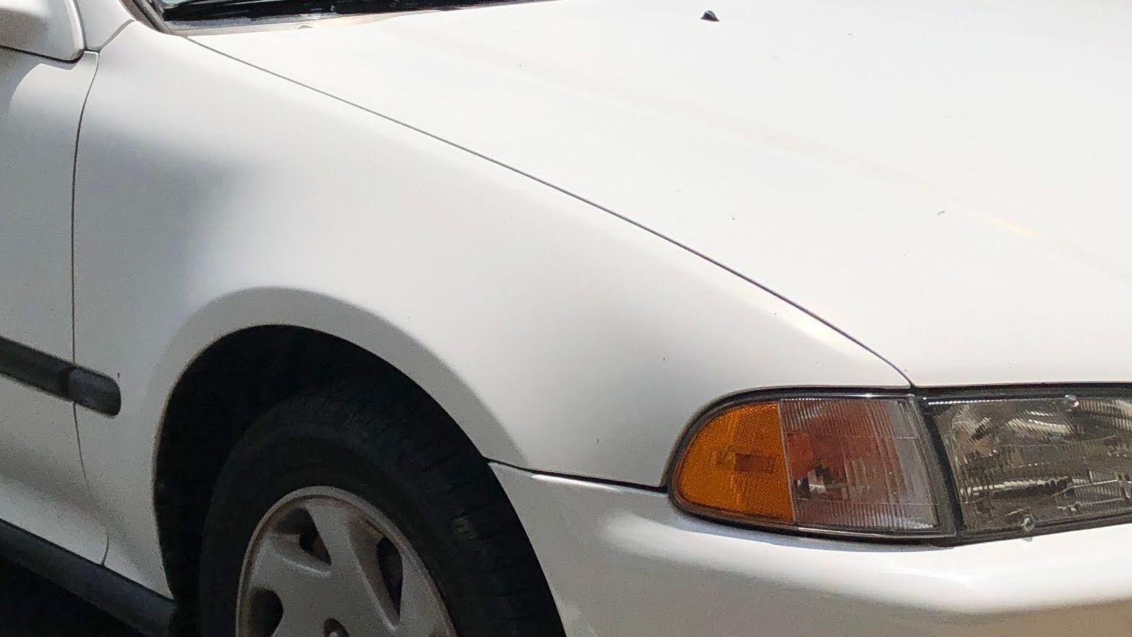 1994 Honda Civic — white coupe, front three-quarter view