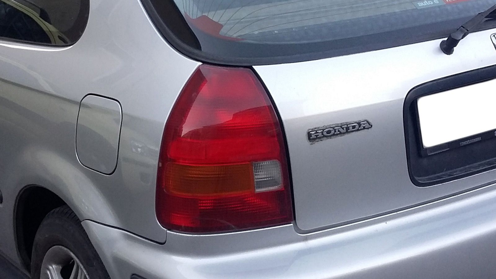 1995 Honda Civic — green hatchback, front three-quarter view