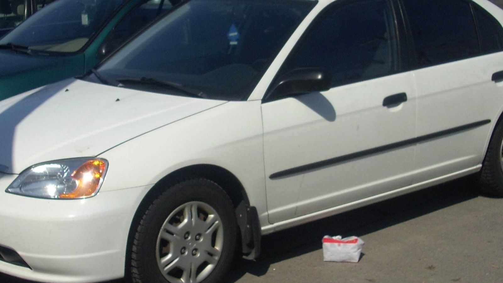 2001 Honda Civic — silver sedan, front three-quarter view