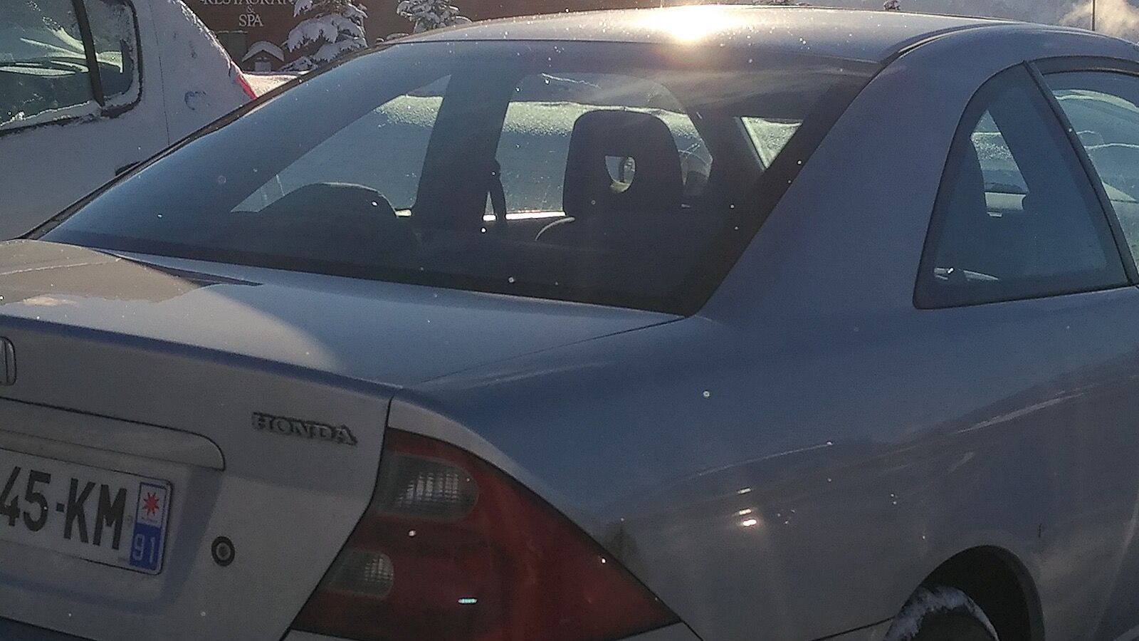 2002 Honda Civic — silver coupe, front three-quarter view