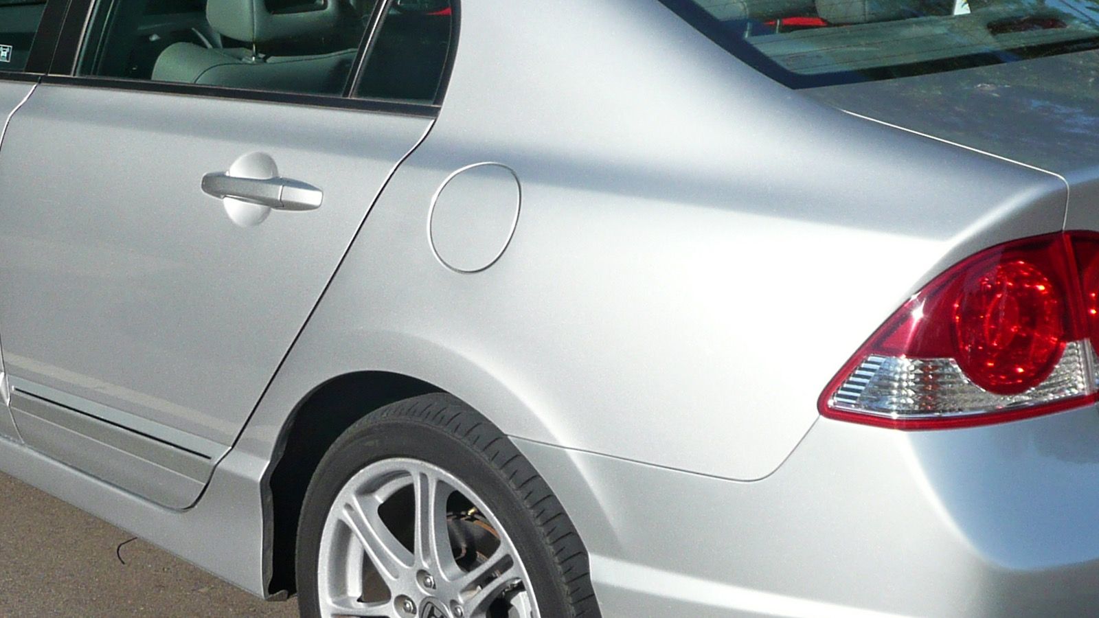 2006 Honda Civic — silver sedan, front three-quarter view