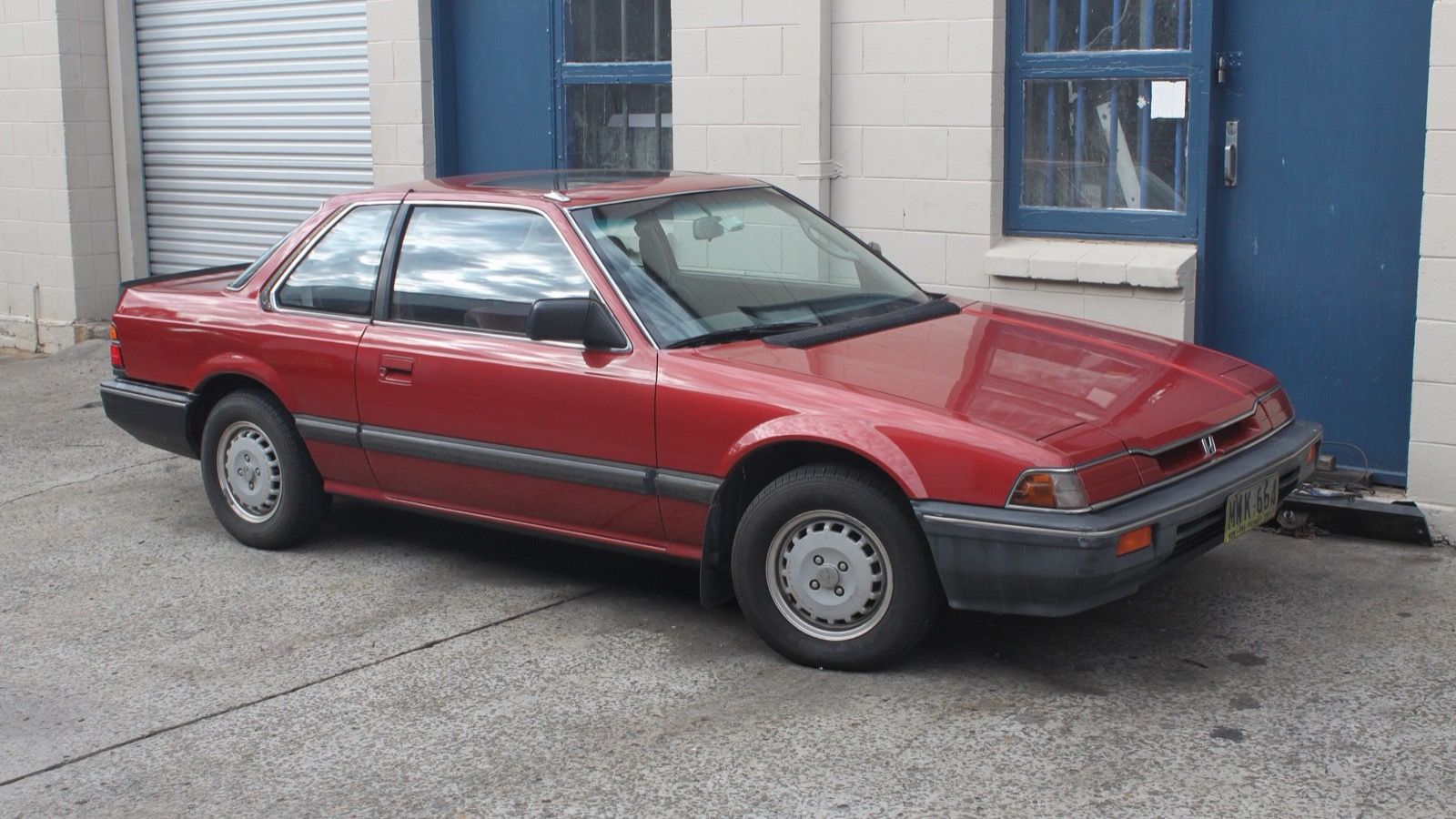 Red 1984 Honda Prelude EX coupe, front three-quarter view