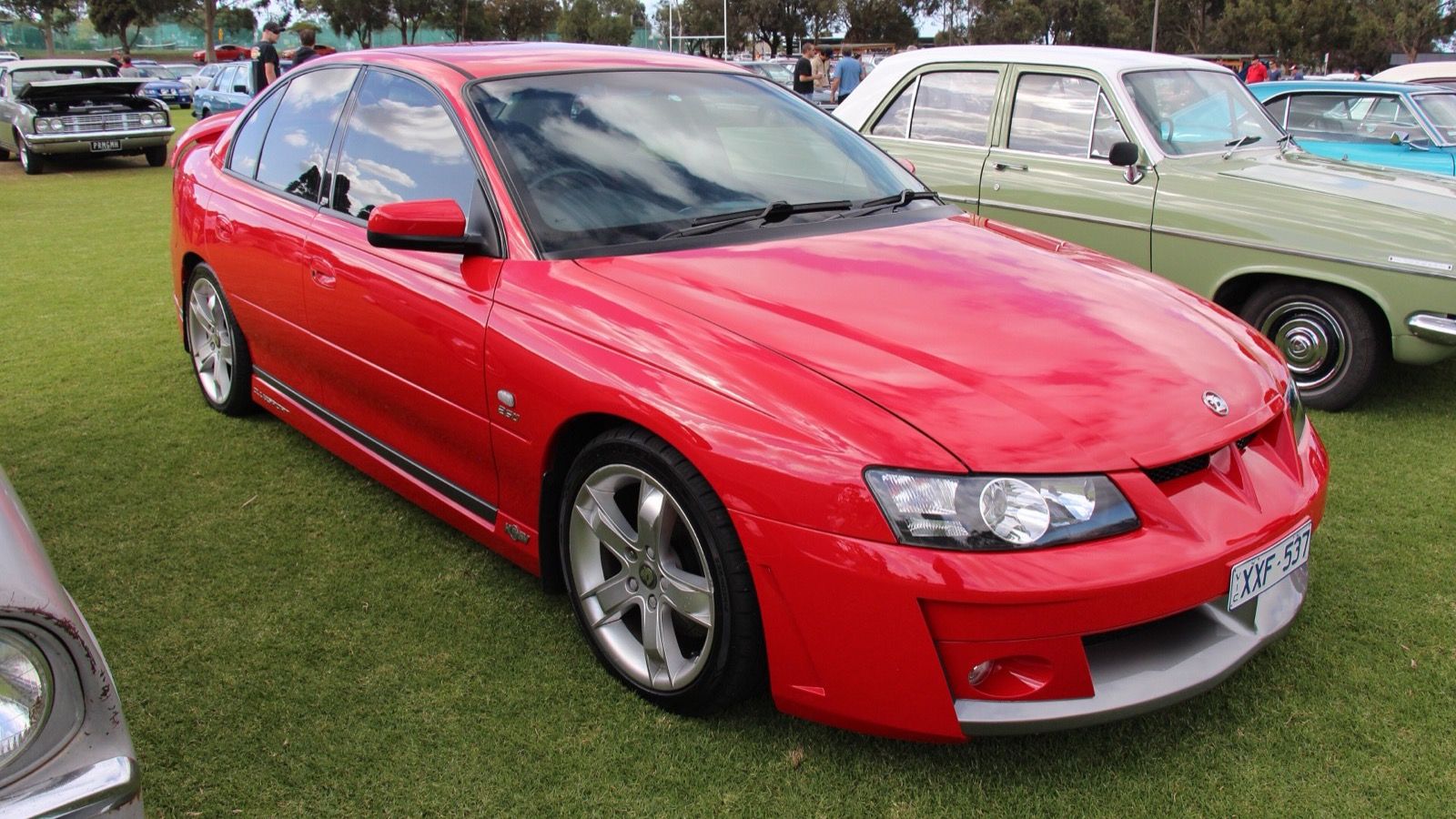 Red 2003 Holden VY HSV ClubSport sedan, front three-quarter view