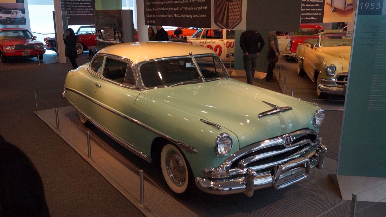 Pale green 1953 Hudson Hornet step-down coupe on museum display, front three-quarter view