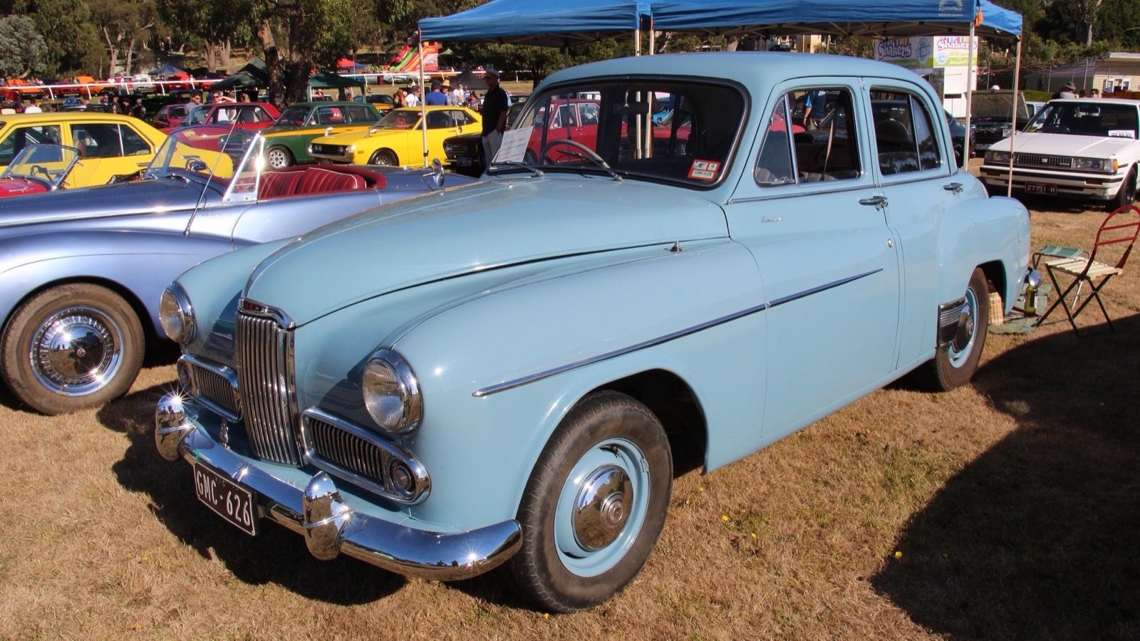 Light blue 1956 Humber Hawk Mk VI saloon at a car show, front three-quarter view