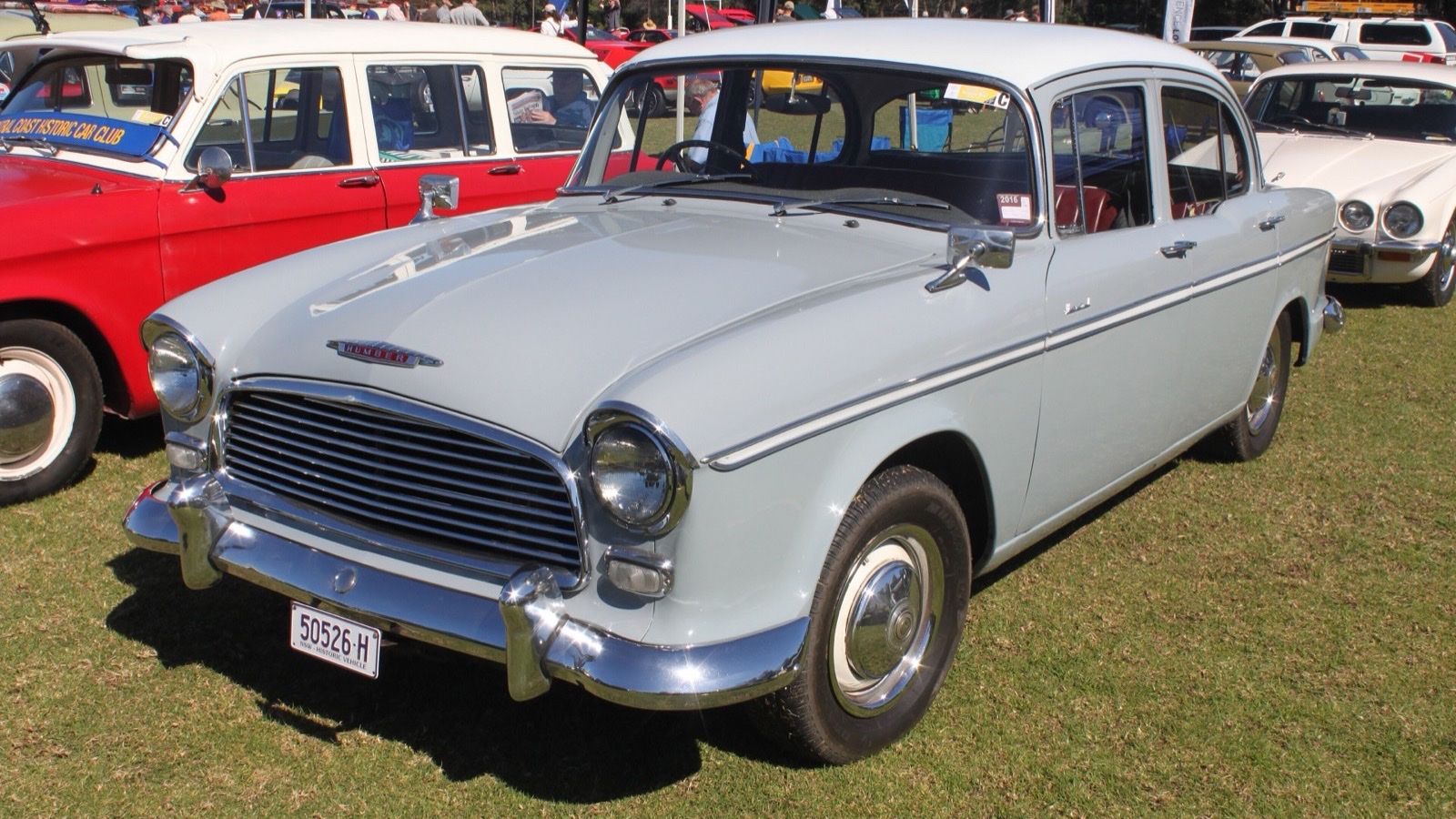 Pale grey 1962 Humber Hawk Series II saloon on grass, front three-quarter view