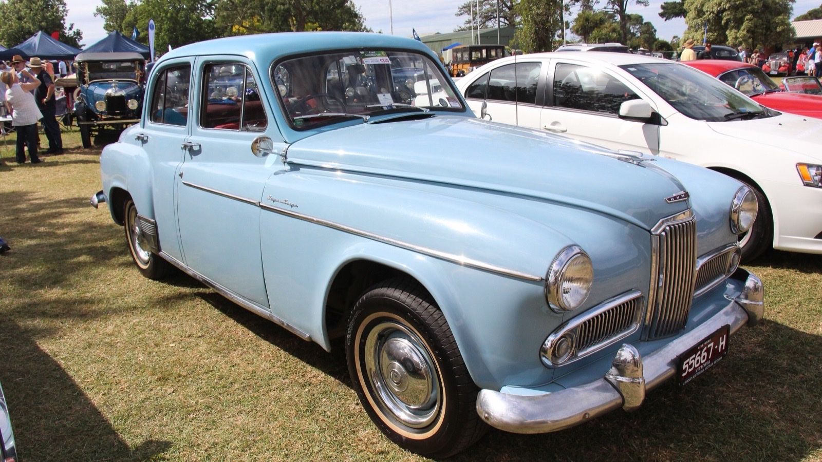 Light blue 1953 Humber Super Snipe Mk IV saloon on grass, front three-quarter view