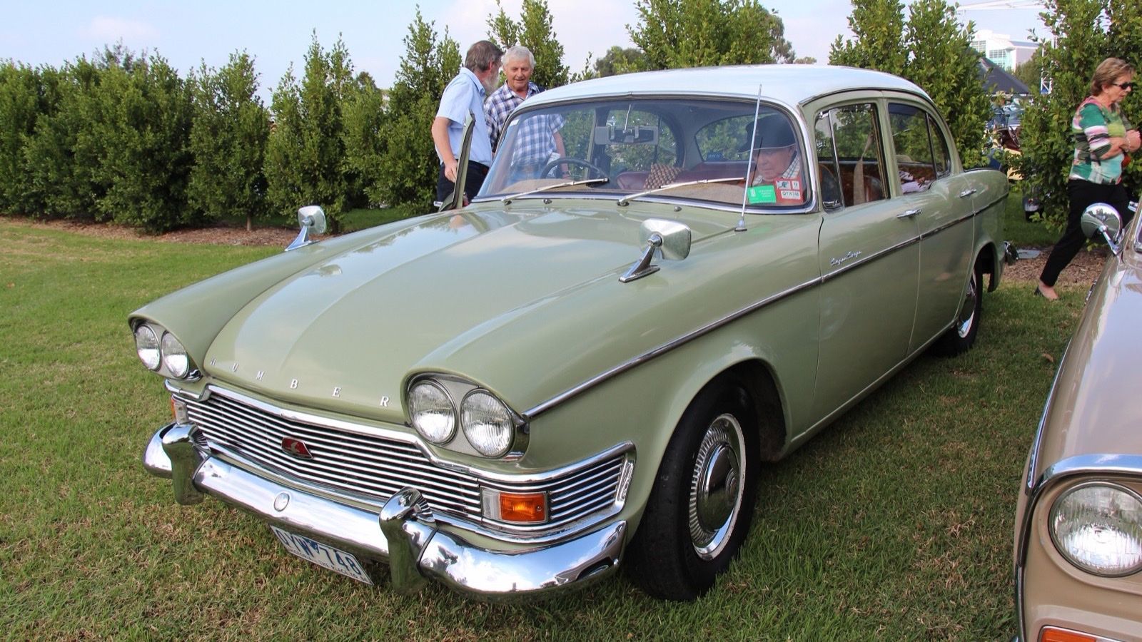 Pale green 1963 Humber Super Snipe Series IV saloon on grass, front three-quarter view